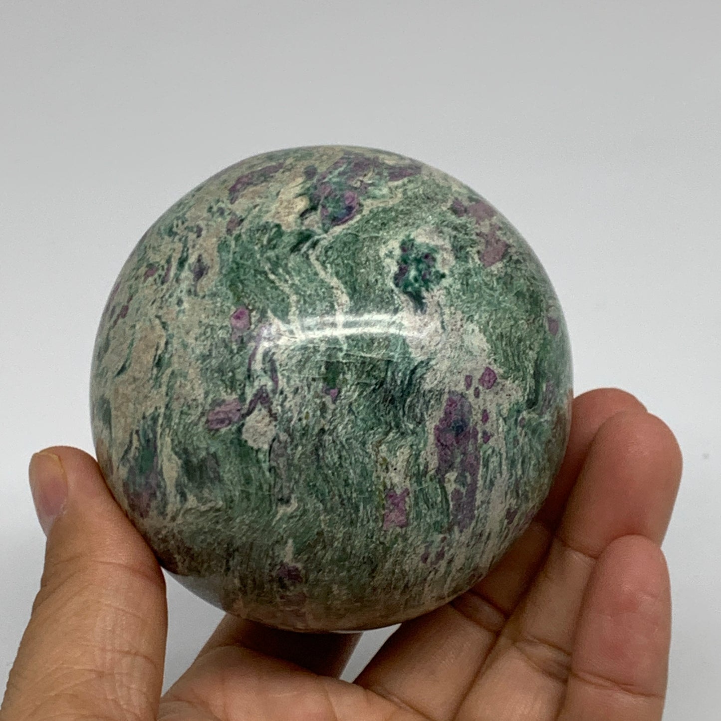 1.35 lbs, 2.9"(75mm), Zoisite with Ruby Sphere Sphere Ball Crystal, B25213