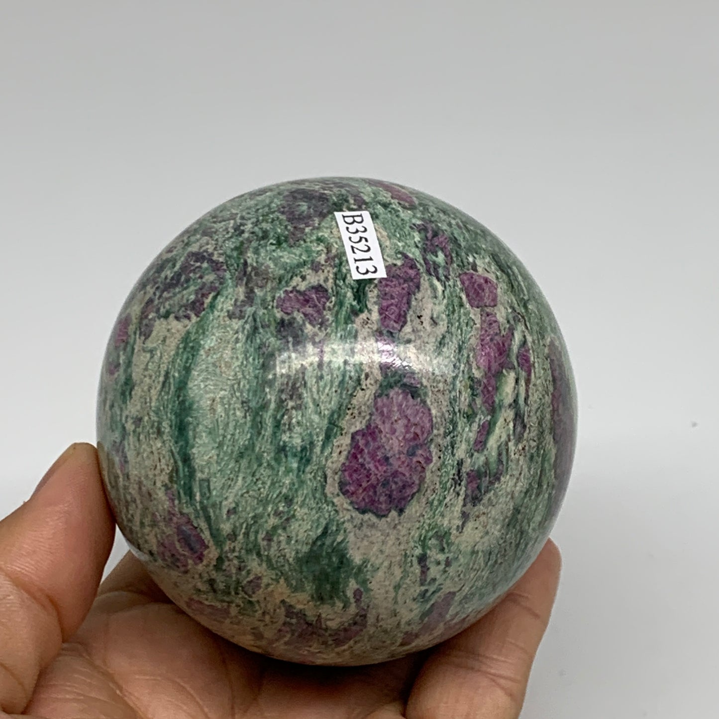 1.35 lbs, 2.9"(75mm), Zoisite with Ruby Sphere Sphere Ball Crystal, B25213