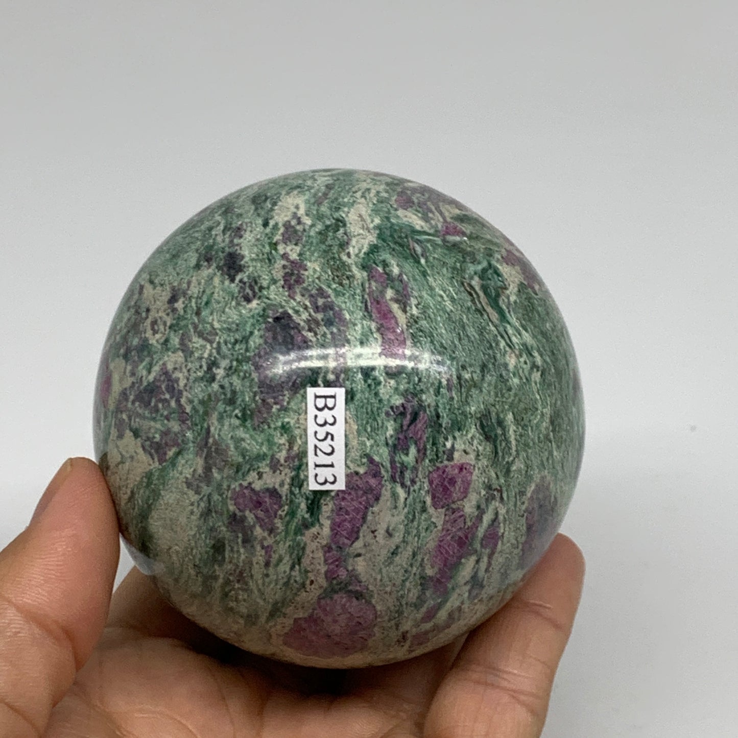 1.35 lbs, 2.9"(75mm), Zoisite with Ruby Sphere Sphere Ball Crystal, B25213