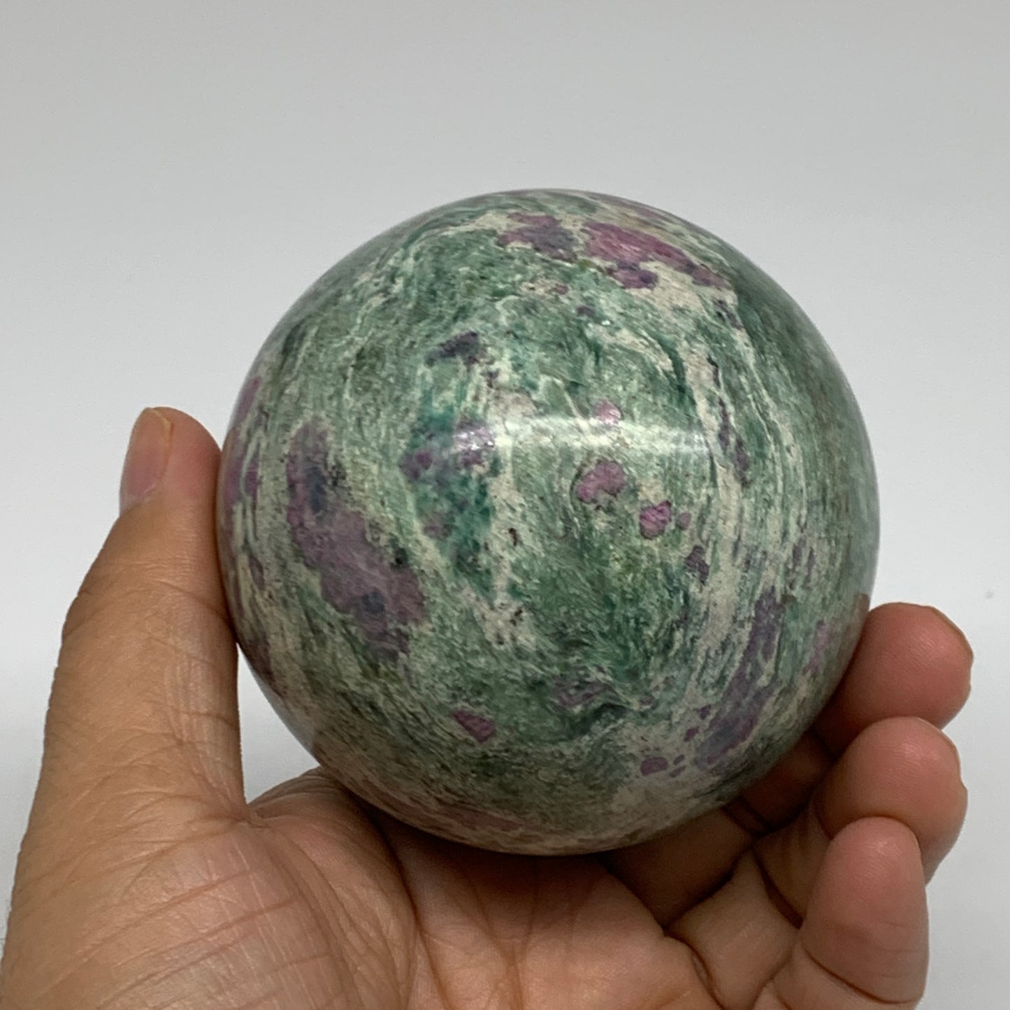 1.35 lbs, 2.9"(75mm), Zoisite with Ruby Sphere Sphere Ball Crystal, B25213