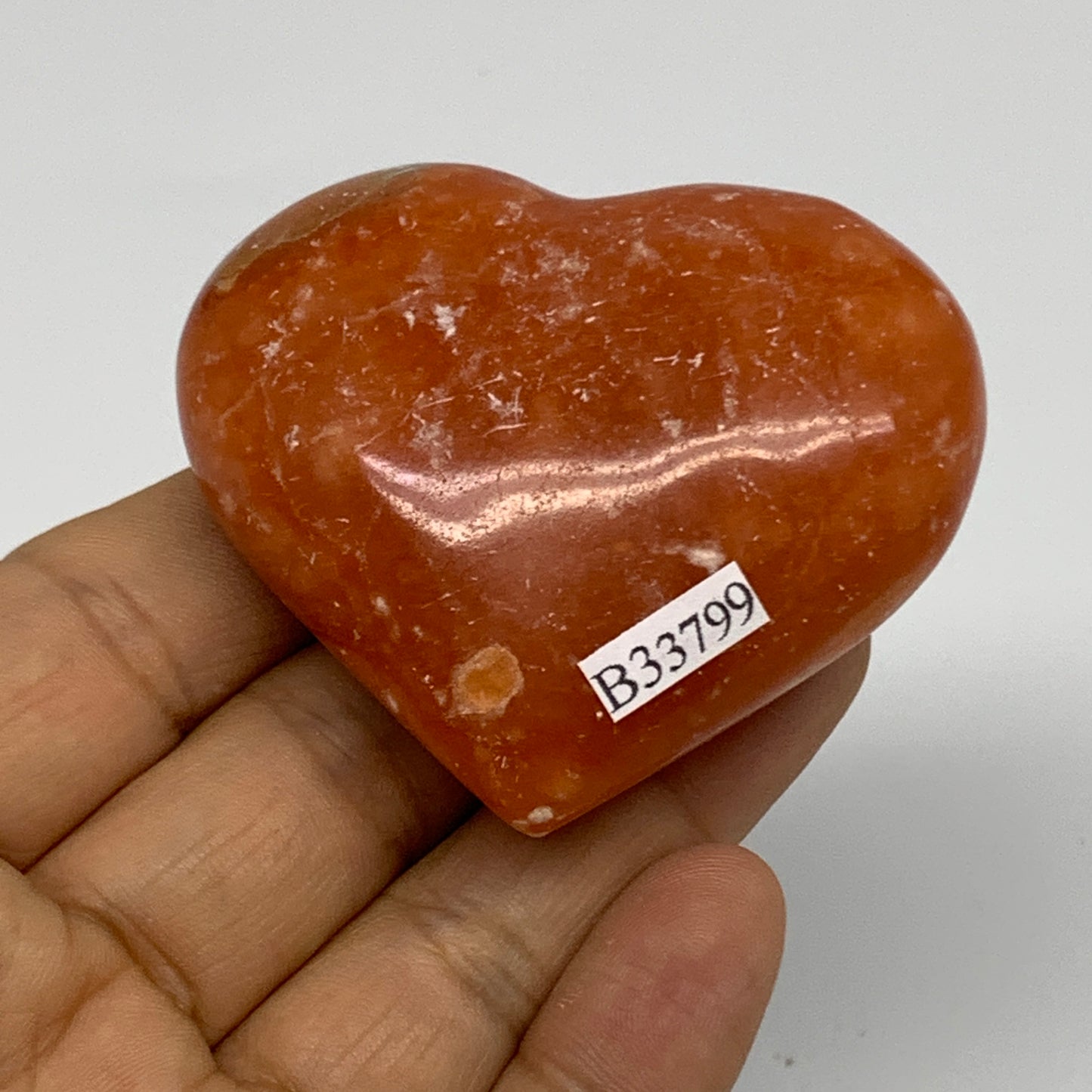 86.5g,2"x2.4"x1" Orange Calcite Heart Gemstones from Madagascar, B33799