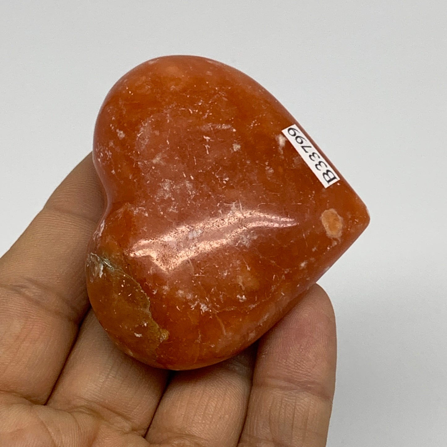 86.5g,2"x2.4"x1" Orange Calcite Heart Gemstones from Madagascar, B33799