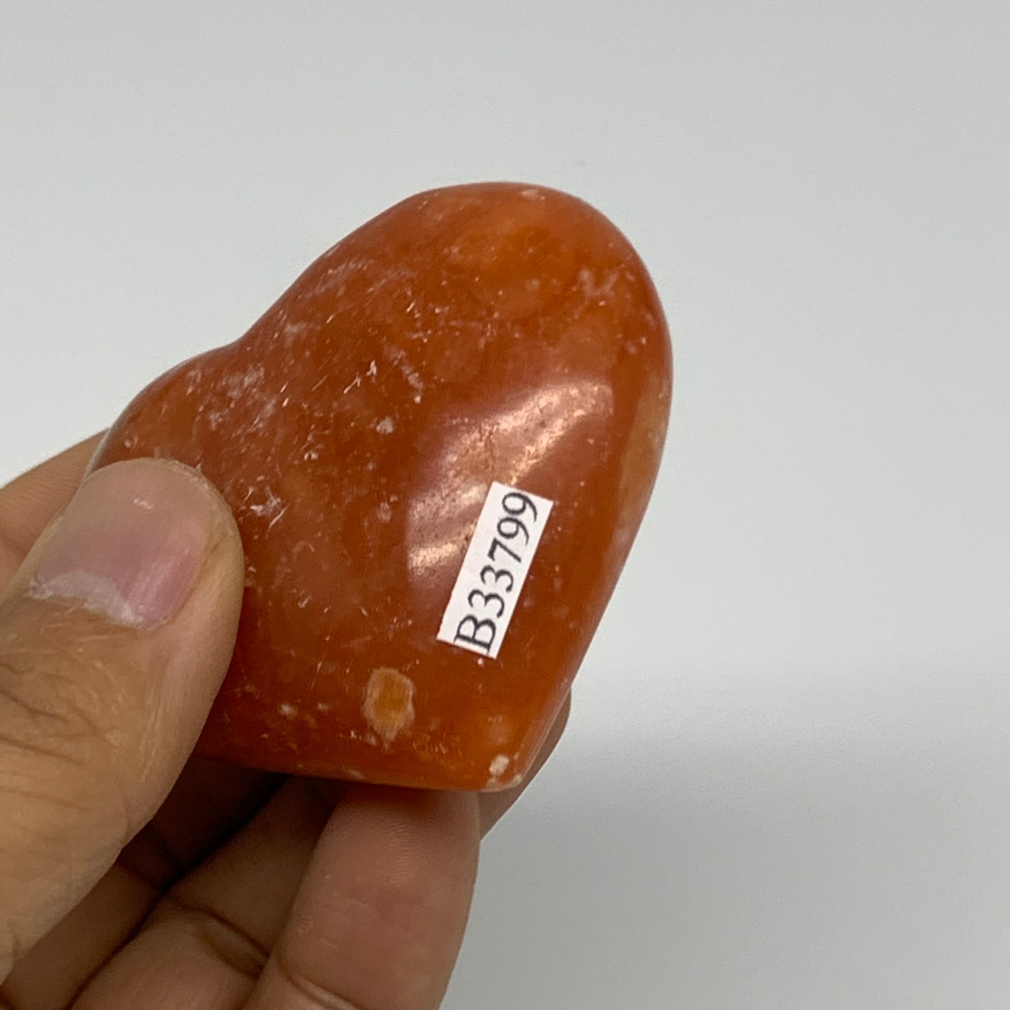 86.5g,2"x2.4"x1" Orange Calcite Heart Gemstones from Madagascar, B33799