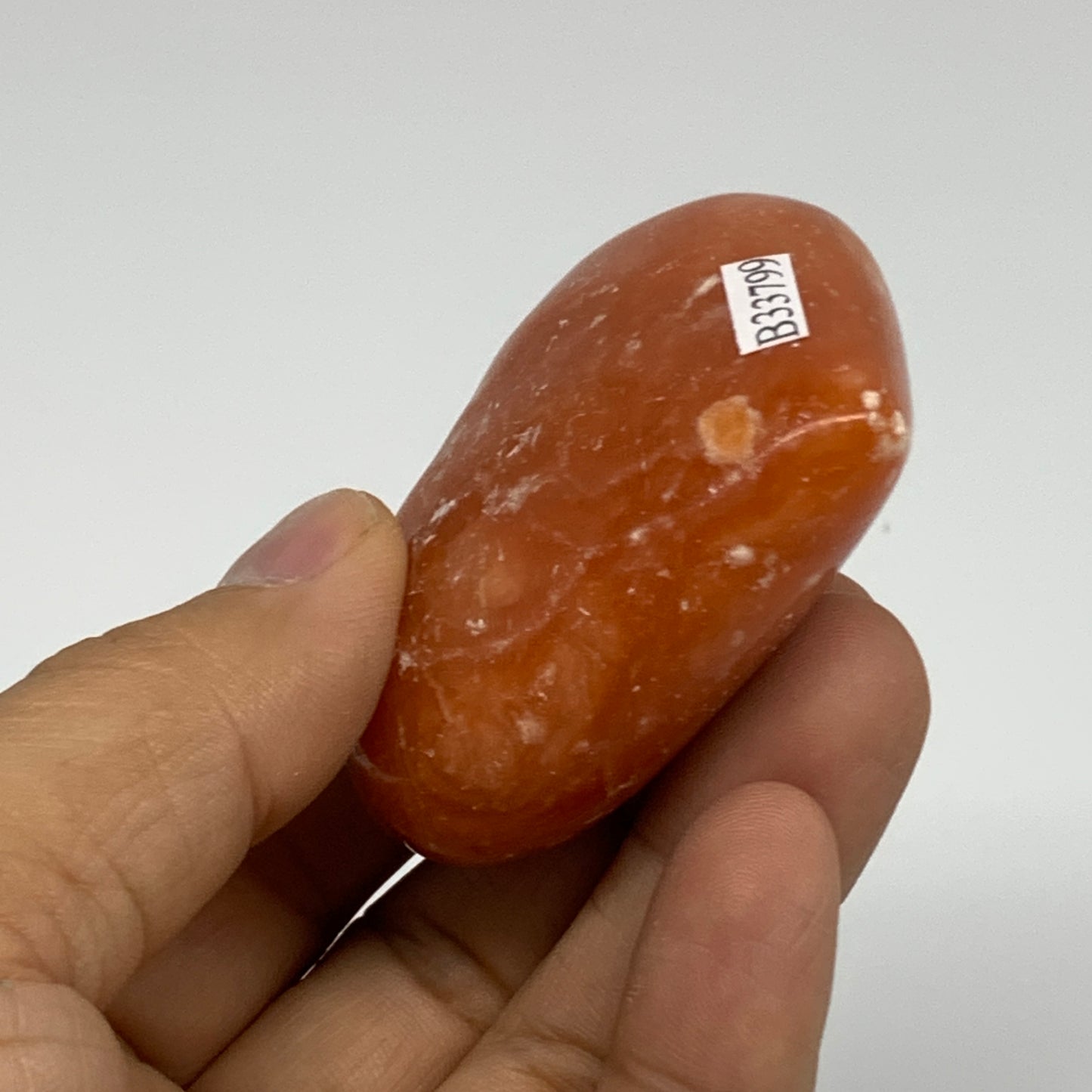 86.5g,2"x2.4"x1" Orange Calcite Heart Gemstones from Madagascar, B33799