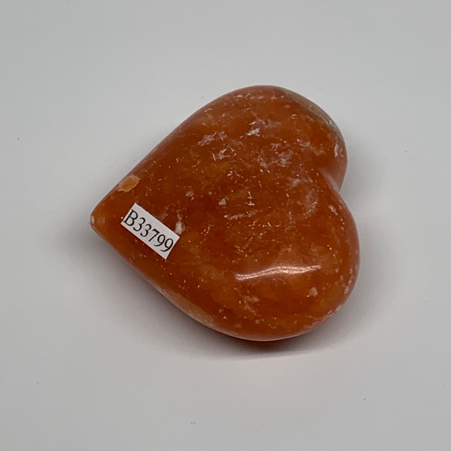 86.5g,2"x2.4"x1" Orange Calcite Heart Gemstones from Madagascar, B33799