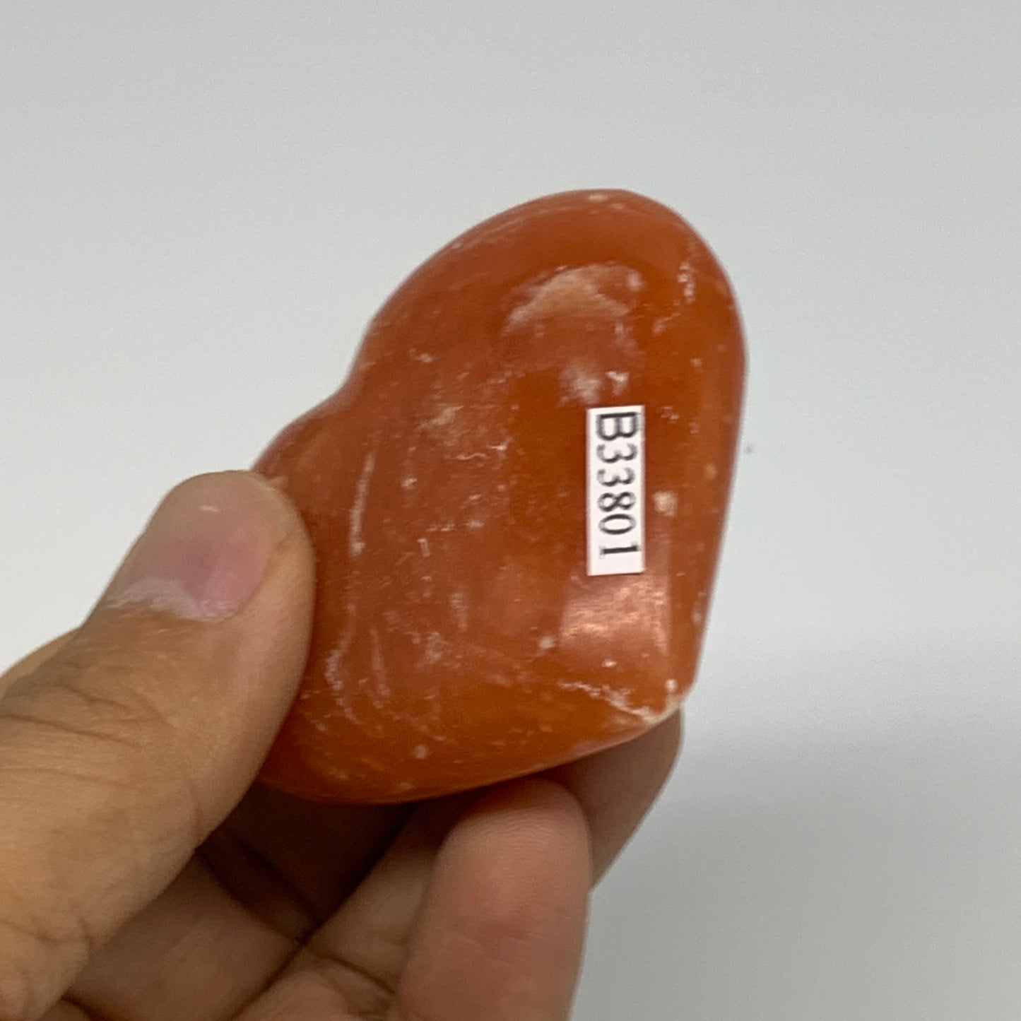 80.3g,2.1"x2.3"x0.9" Orange Calcite Heart Gemstones from Madagascar, B33801