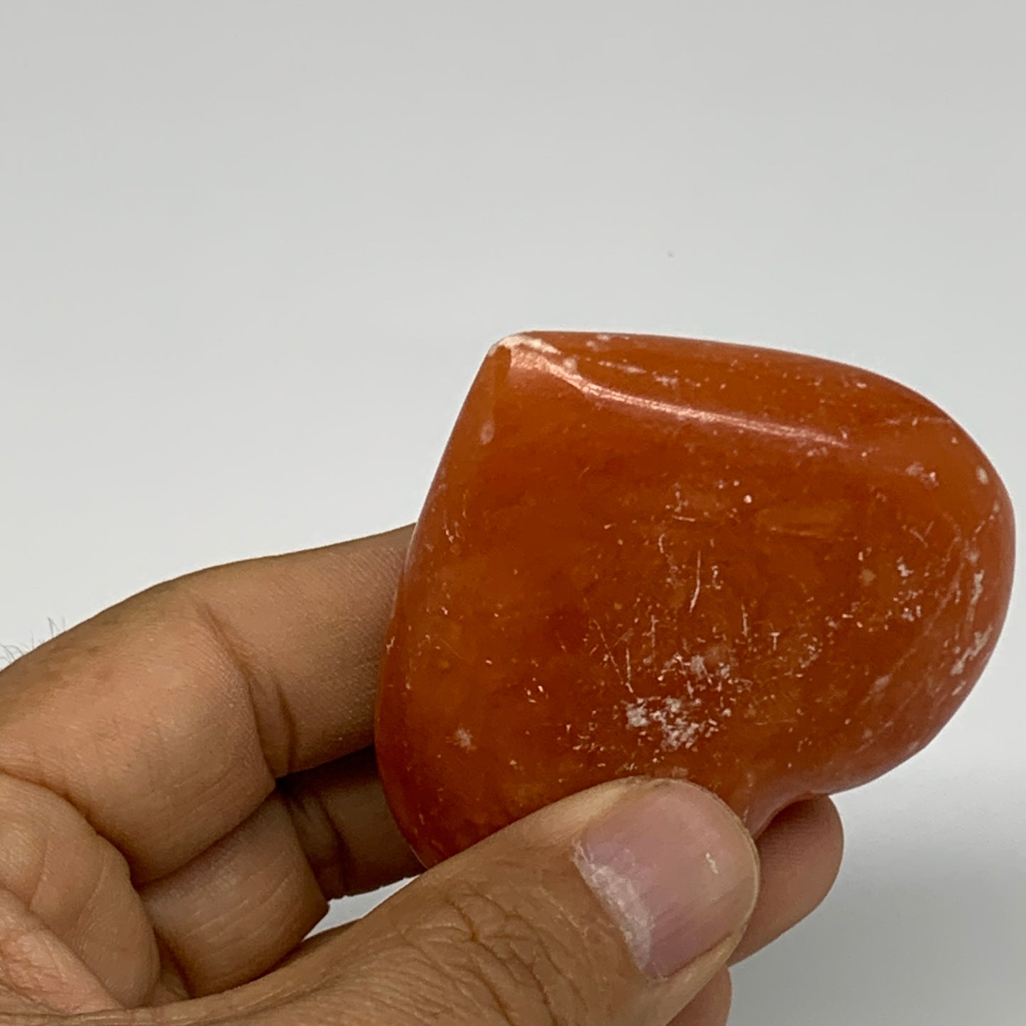 80.3g,2.1"x2.3"x0.9" Orange Calcite Heart Gemstones from Madagascar, B33801