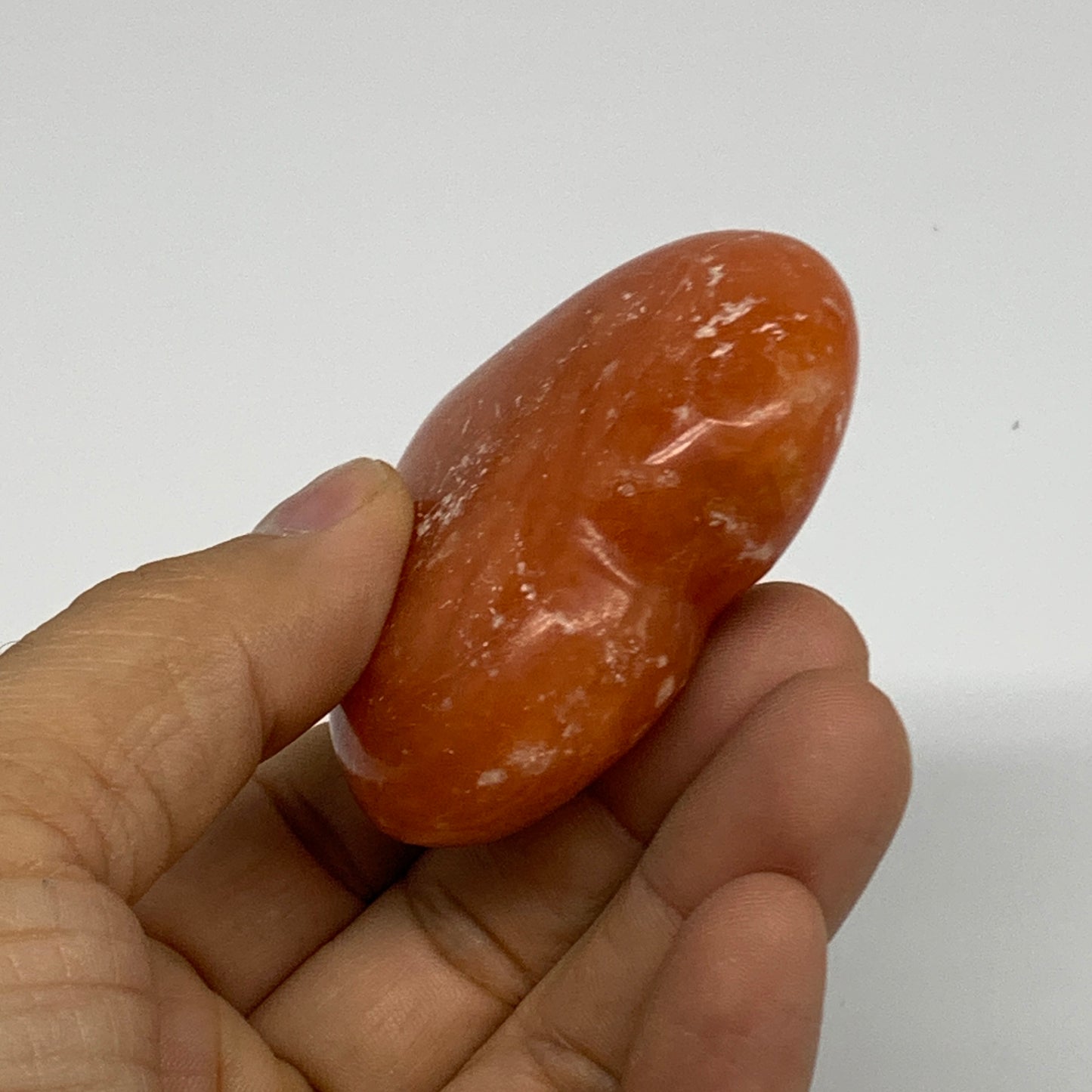 80.3g,2.1"x2.3"x0.9" Orange Calcite Heart Gemstones from Madagascar, B33801