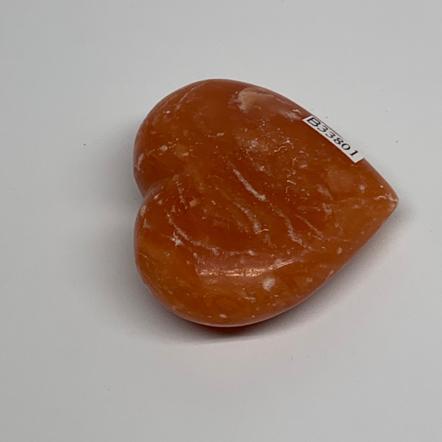 80.3g,2.1"x2.3"x0.9" Orange Calcite Heart Gemstones from Madagascar, B33801