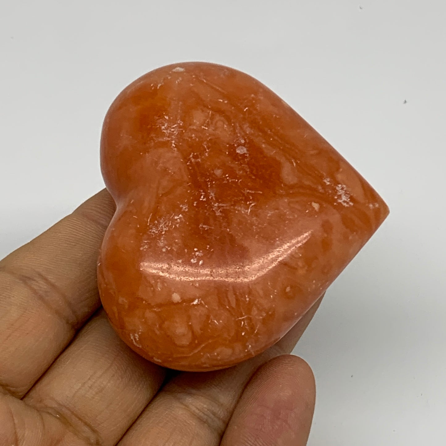 96.8g,2.1"x2.4"x1" Orange Calcite Heart Gemstones from Madagascar, B33803