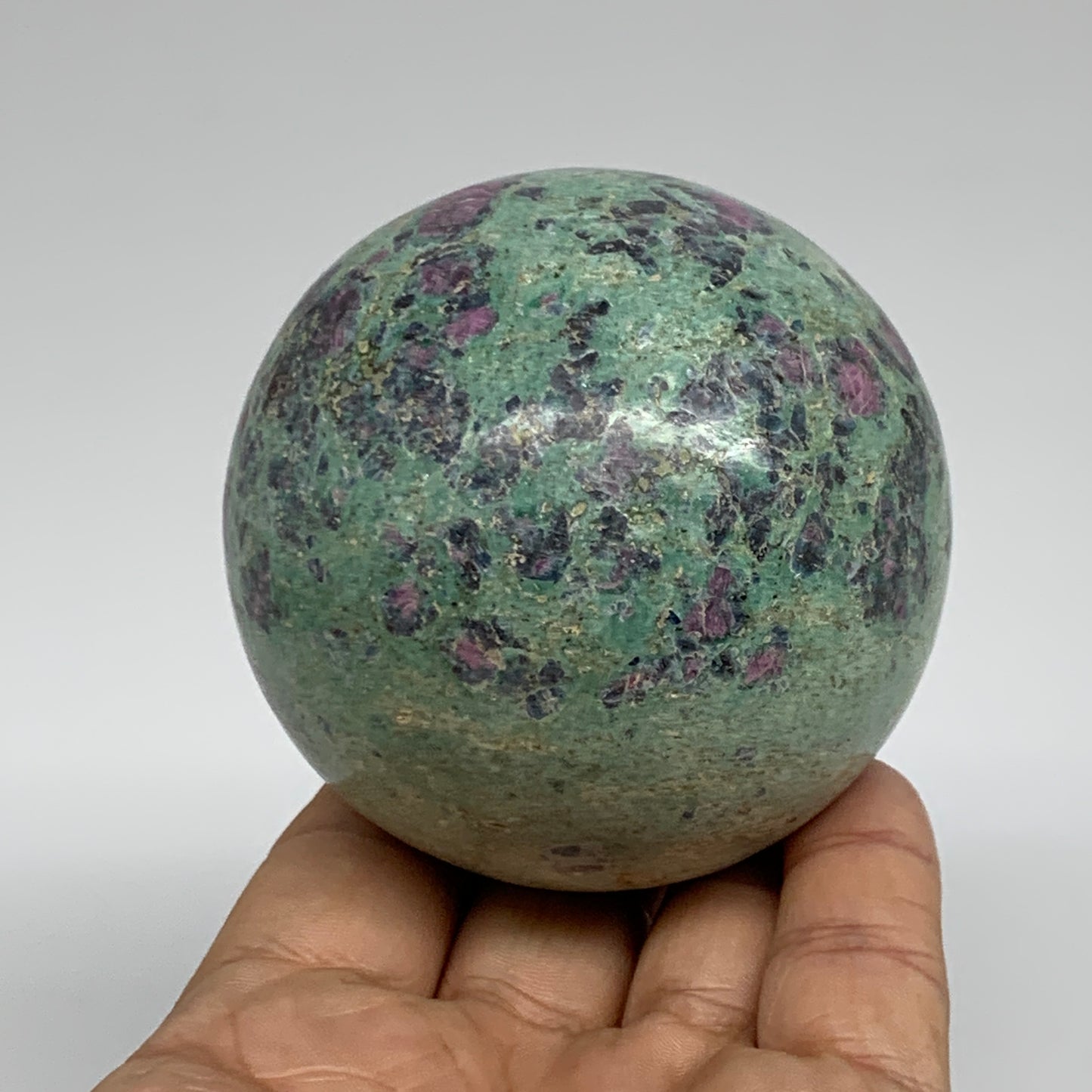 1.13 lbs, 2.7"(70mm), Zoisite with Ruby Sphere Sphere Ball Crystal, B25217