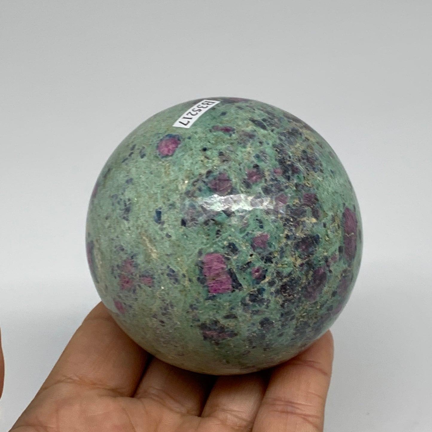 1.13 lbs, 2.7"(70mm), Zoisite with Ruby Sphere Sphere Ball Crystal, B25217