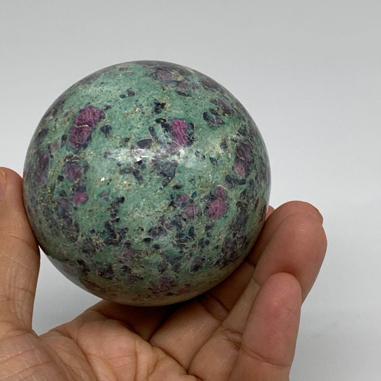 1.13 lbs, 2.7"(70mm), Zoisite with Ruby Sphere Sphere Ball Crystal, B25217