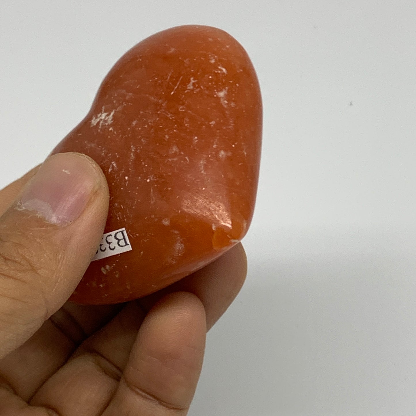 105g,2"x2.4"x1.1" Orange Calcite Heart Gemstones from Madagascar, B33807