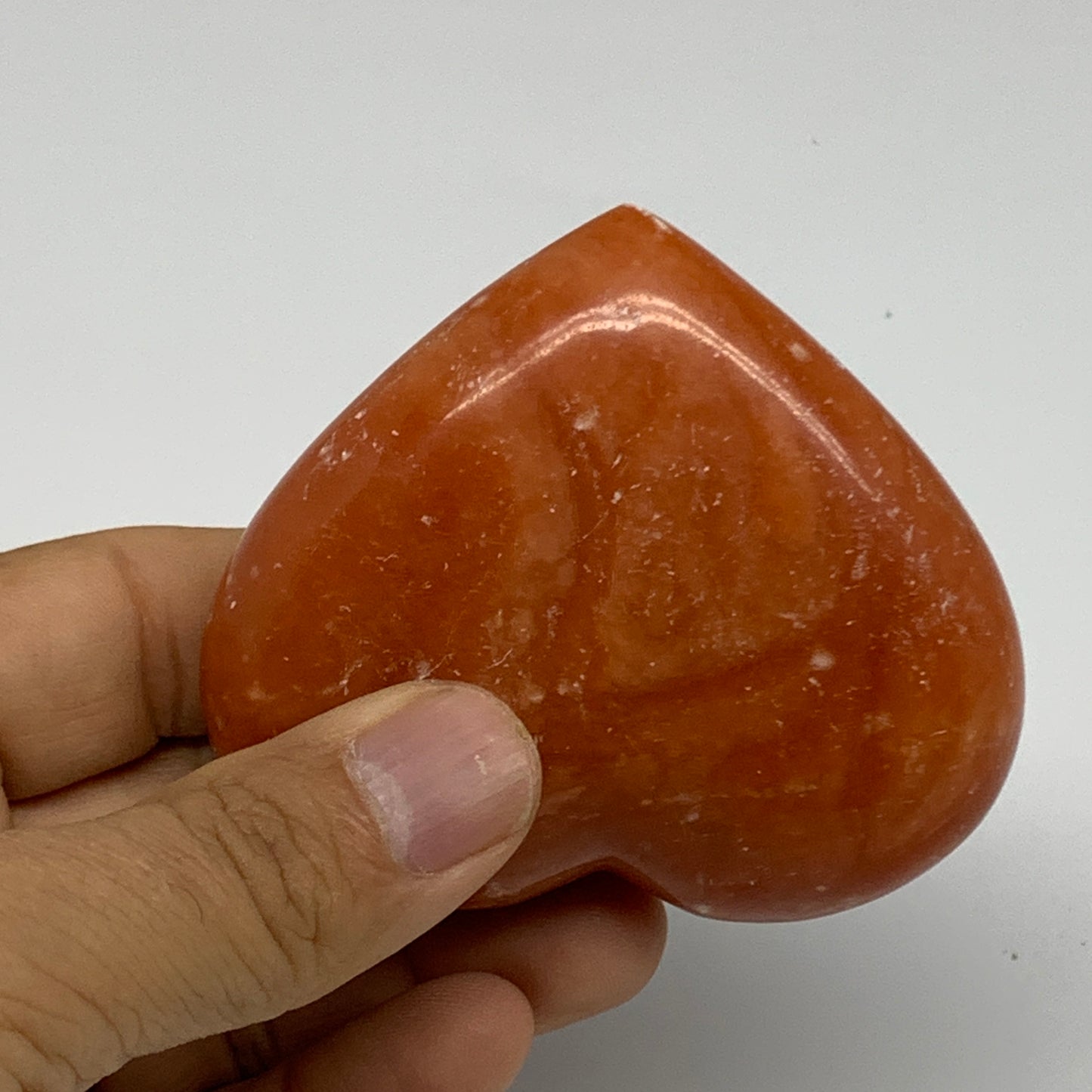 153.2g,2.5"x2.9"x1.1" Orange Calcite Heart Gemstones from Madagascar, B33810