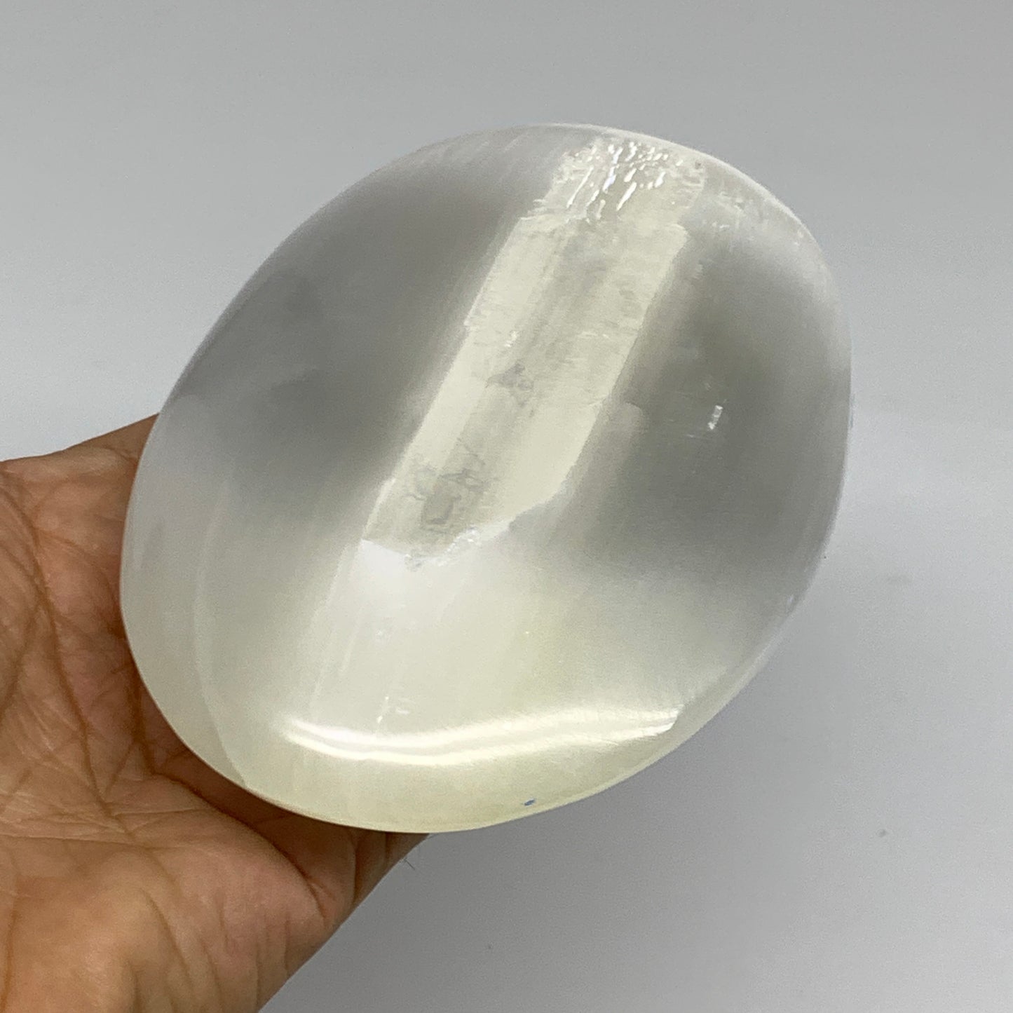 0.95 lbs, 5.2"x3.5"x1.3", White Selenite Palmstone Crystal Pillow Reiki, B35917