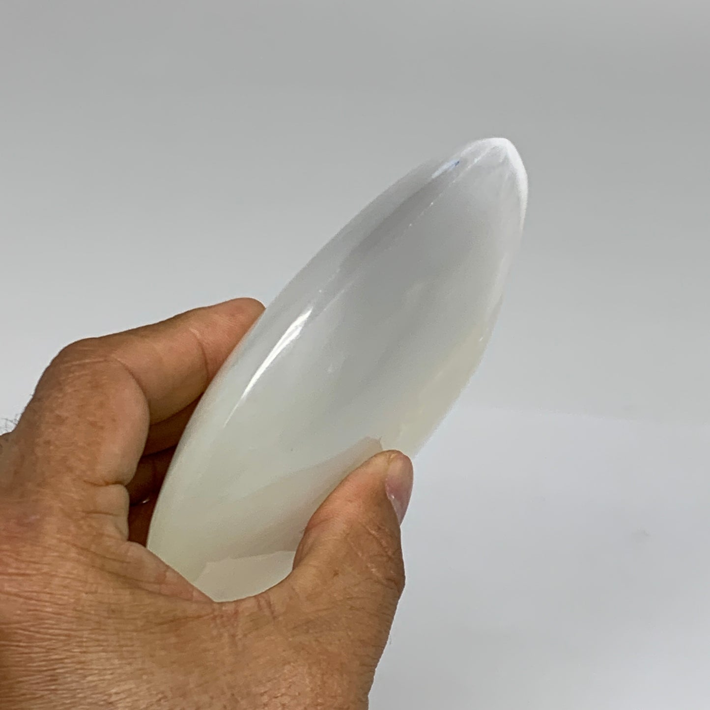 0.95 lbs, 5.2"x3.5"x1.3", White Selenite Palmstone Crystal Pillow Reiki, B35917