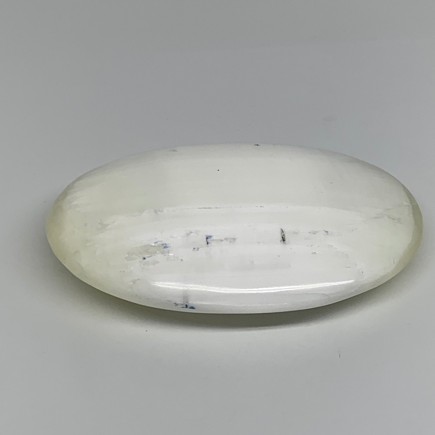 0.95 lbs, 5.2"x3.5"x1.3", White Selenite Palmstone Crystal Pillow Reiki, B35917