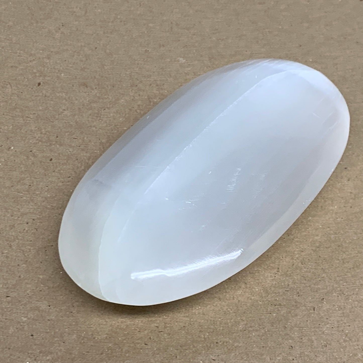 0.62 lbs, 4.9"x2.8"x1.1", White Selenite Palmstone Crystal Pillow Reiki, B35922