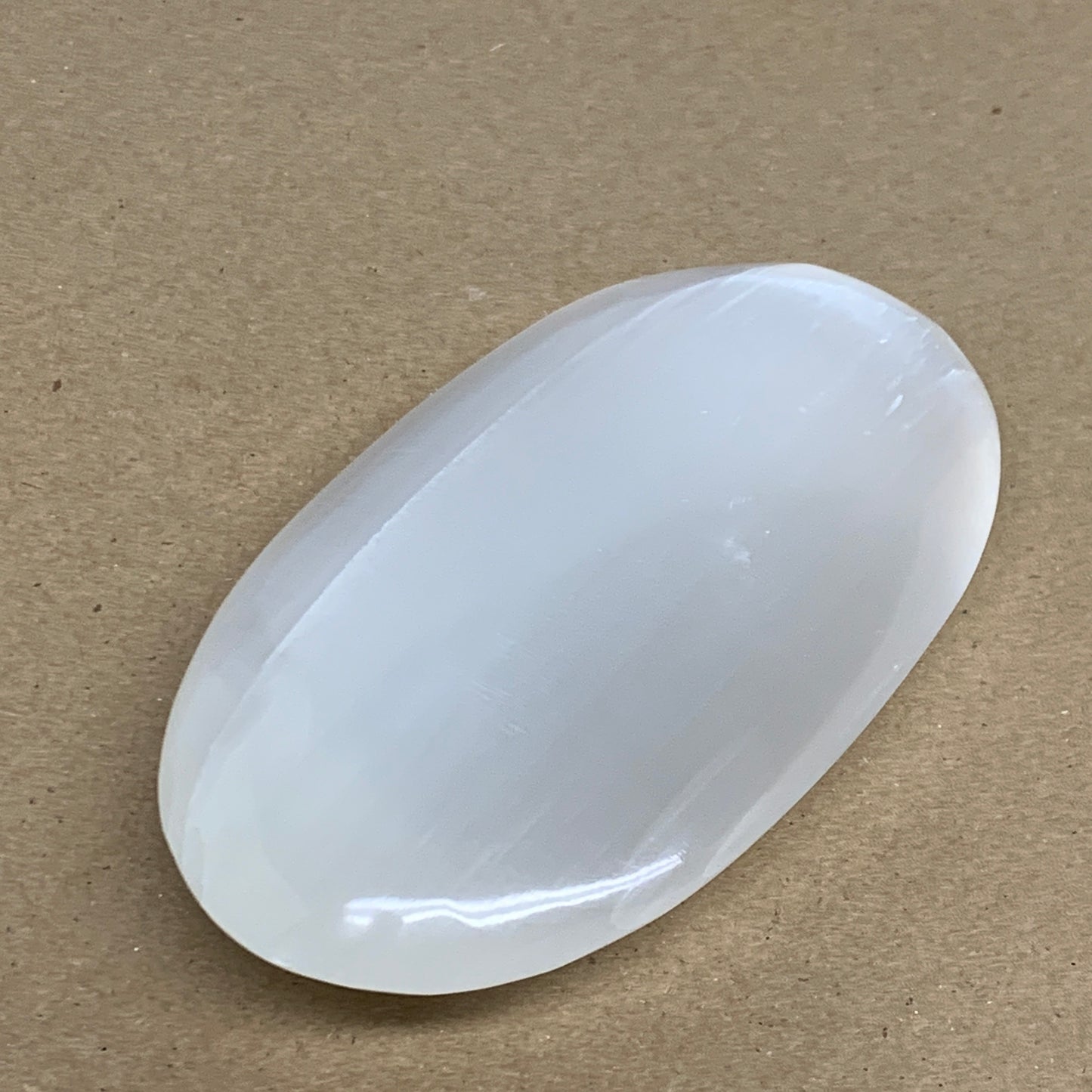 0.62 lbs, 4.9"x2.8"x1.1", White Selenite Palmstone Crystal Pillow Reiki, B35922