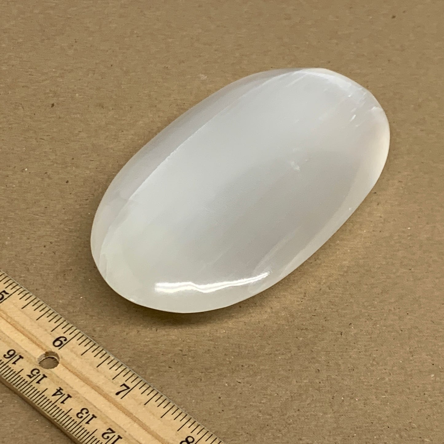 0.62 lbs, 4.9"x2.8"x1.1", White Selenite Palmstone Crystal Pillow Reiki, B35922