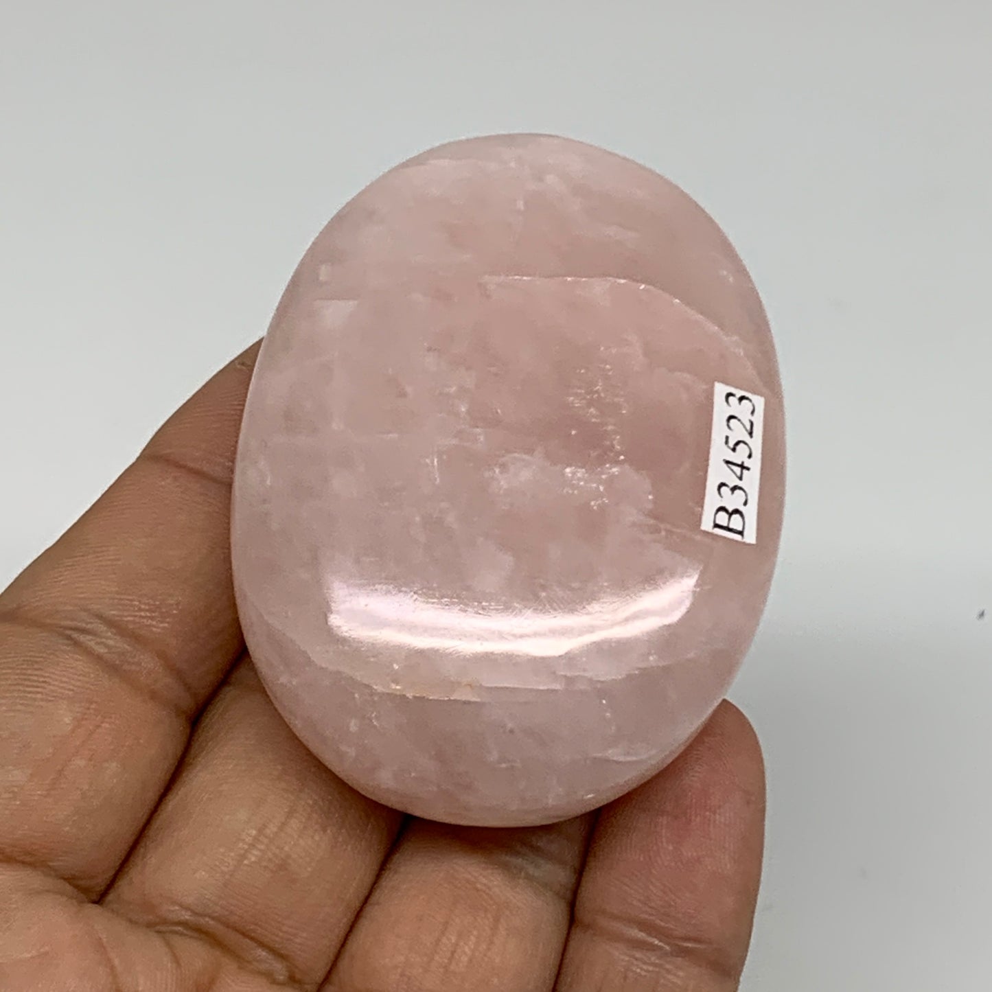 86.6g , 2.4"x1.8"x0.8", Natural Pink Rose Quartz Palm-stone Crystal, B34523