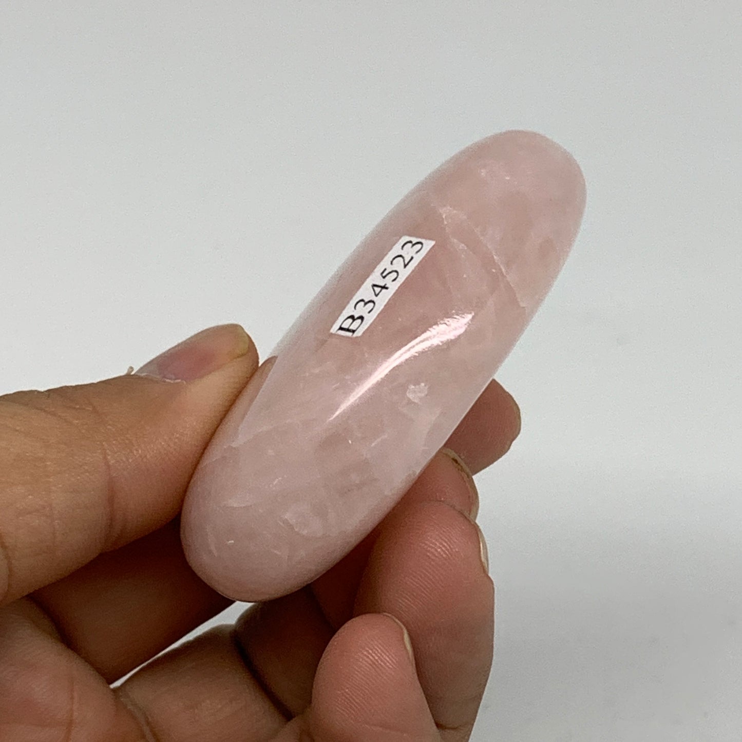 86.6g , 2.4"x1.8"x0.8", Natural Pink Rose Quartz Palm-stone Crystal, B34523