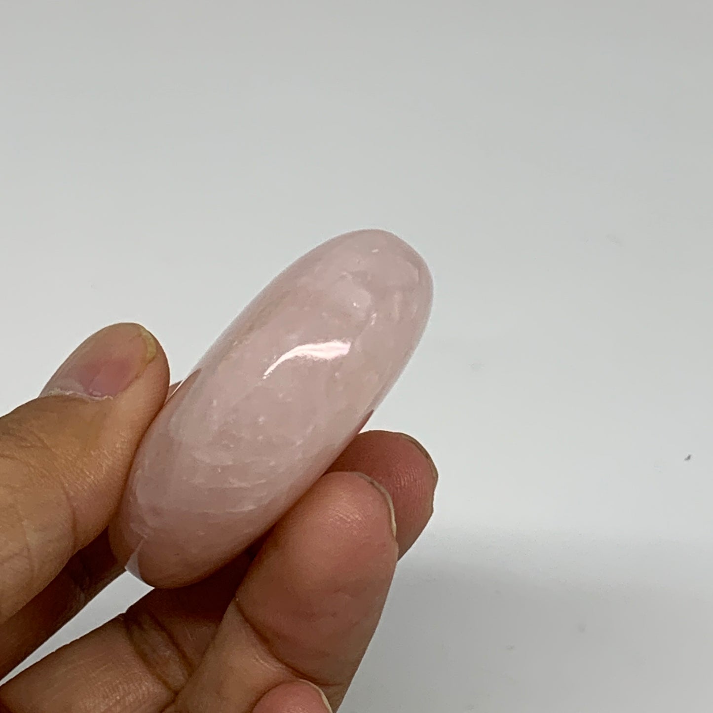 86.6g , 2.4"x1.8"x0.8", Natural Pink Rose Quartz Palm-stone Crystal, B34523