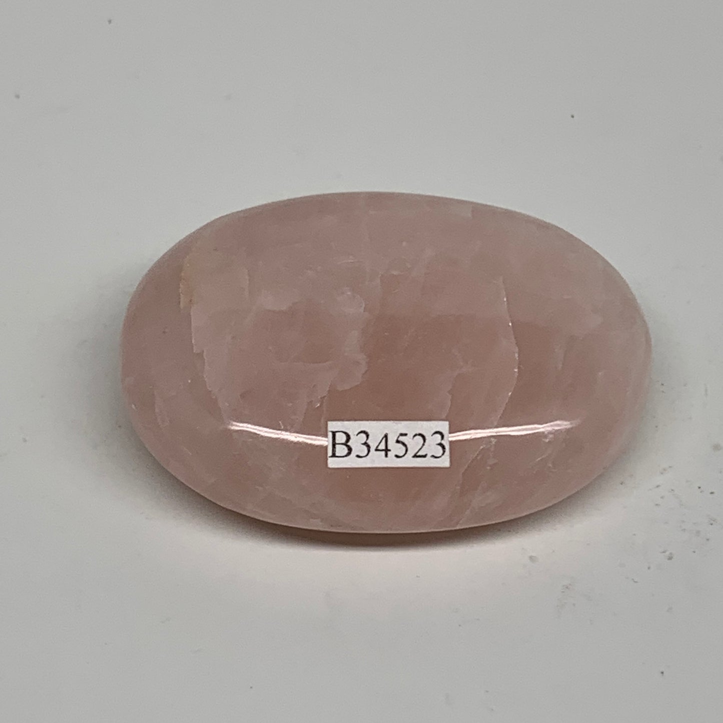 86.6g , 2.4"x1.8"x0.8", Natural Pink Rose Quartz Palm-stone Crystal, B34523