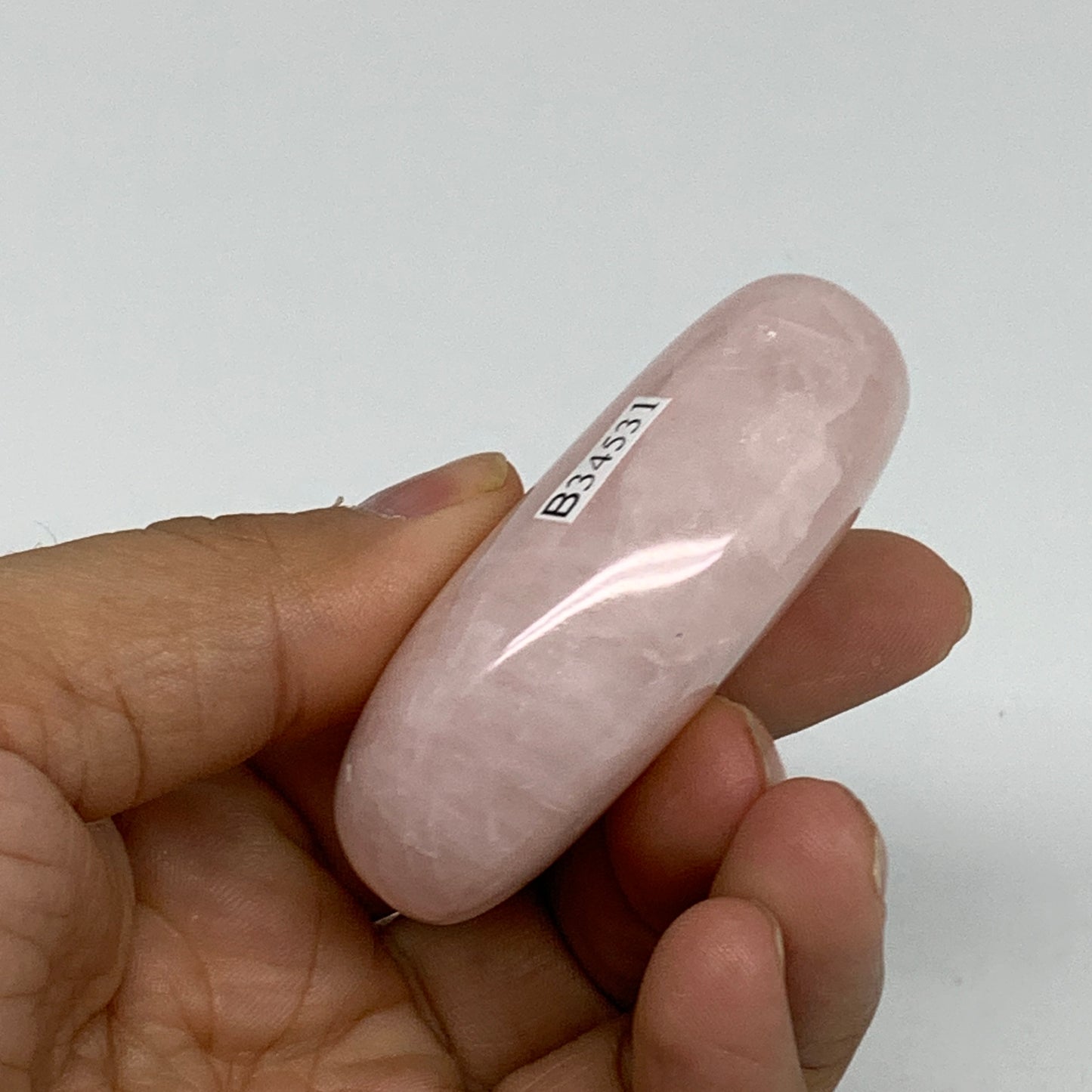 88g , 2.4"x1.5"x0.9", Natural Pink Rose Quartz Palm-stone Crystal, B34531