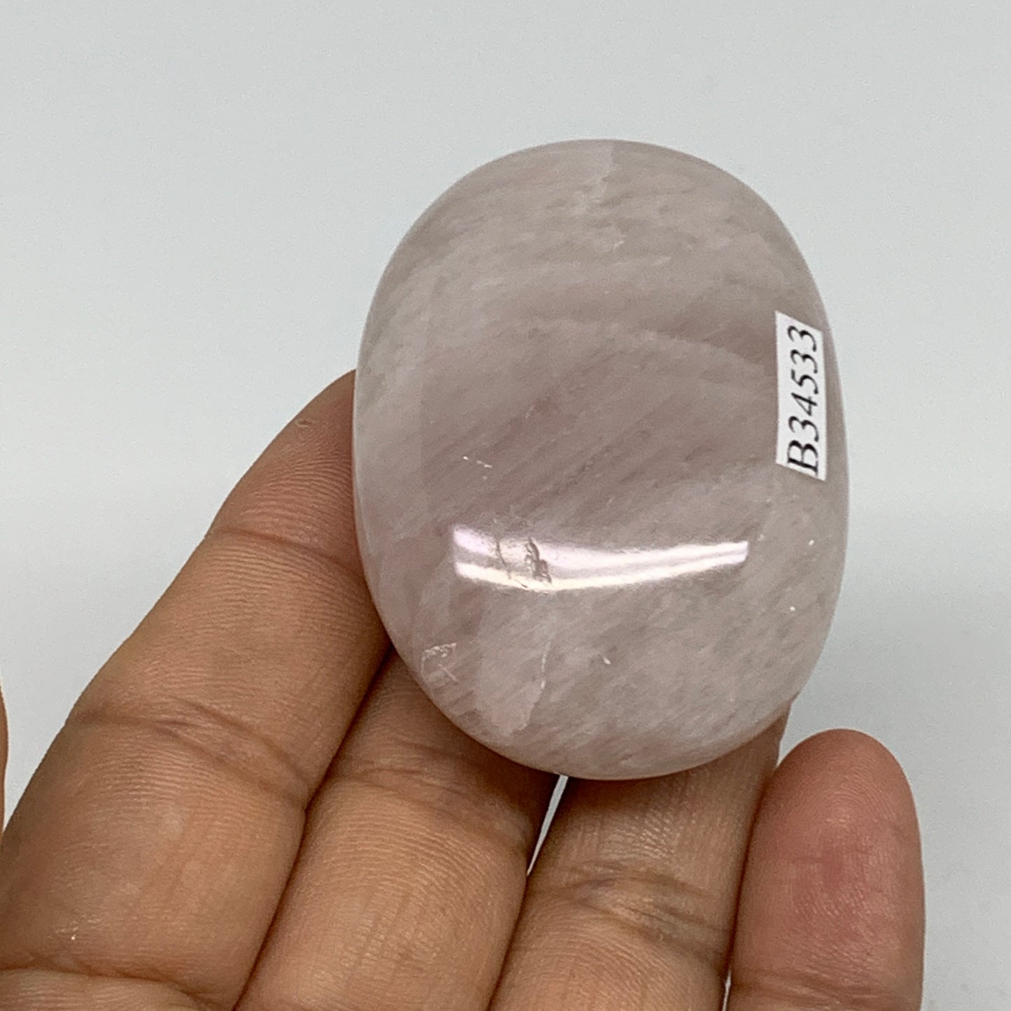 72g , 2.1"x1.5"x0.9", Natural Pink Rose Quartz Palm-stone Crystal, B34533