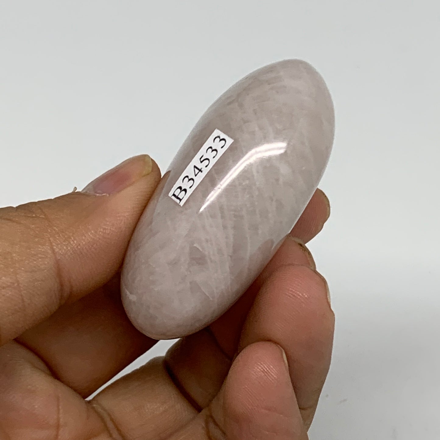 72g , 2.1"x1.5"x0.9", Natural Pink Rose Quartz Palm-stone Crystal, B34533