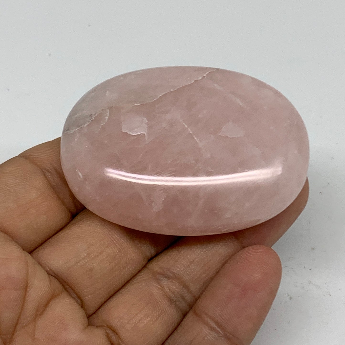 68.2g , 2.2"x1.6"x0.7", Natural Pink Rose Quartz Palm-stone Crystal, B34536