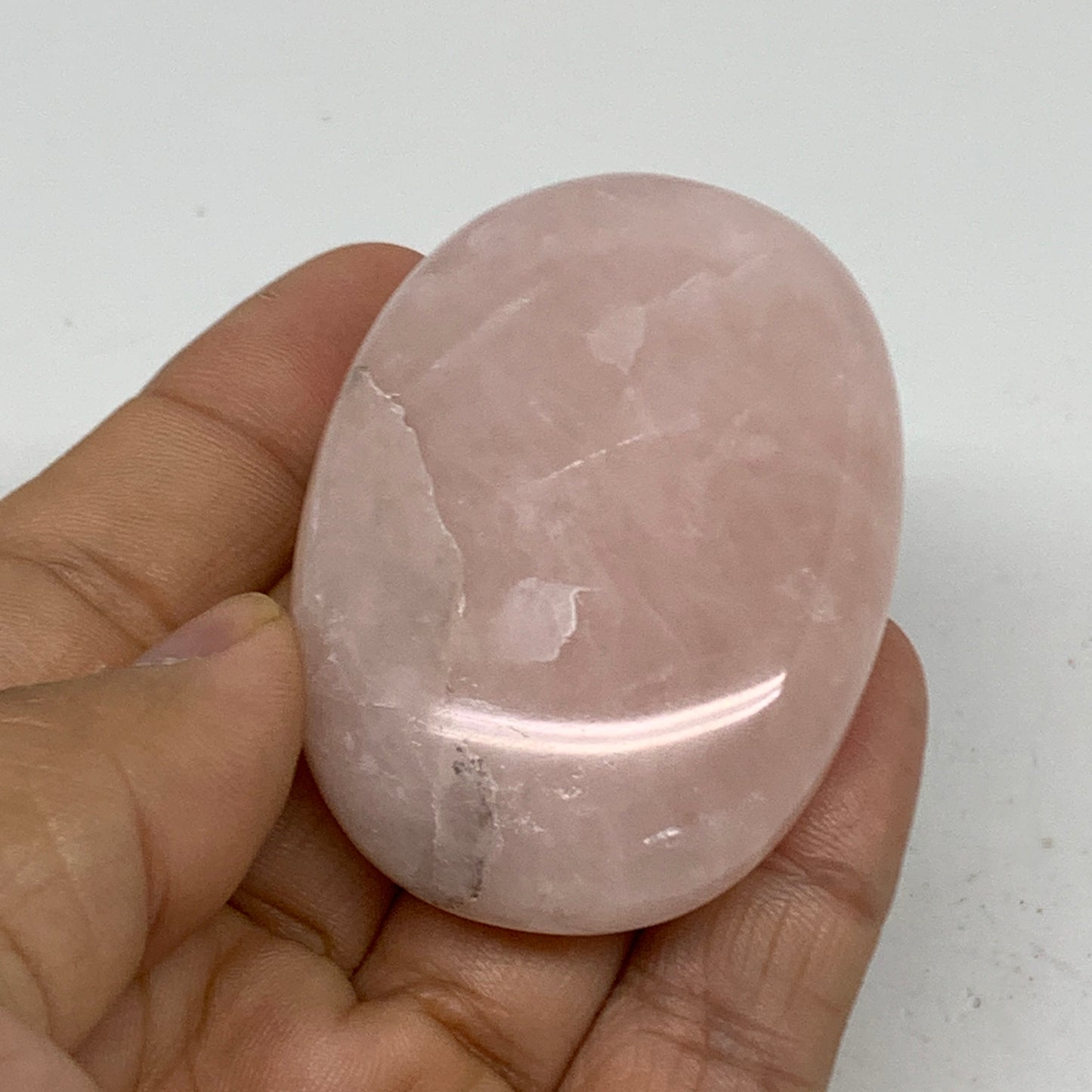 68.2g , 2.2"x1.6"x0.7", Natural Pink Rose Quartz Palm-stone Crystal, B34536