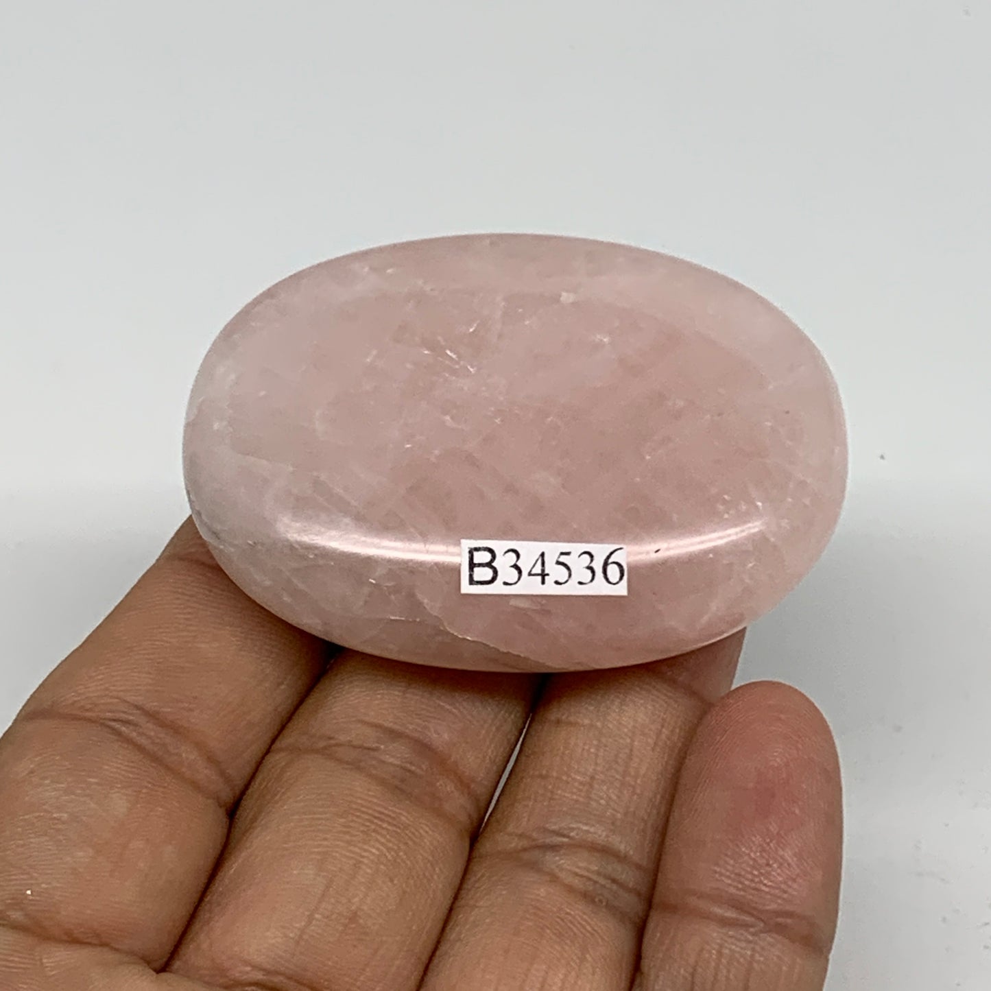 68.2g , 2.2"x1.6"x0.7", Natural Pink Rose Quartz Palm-stone Crystal, B34536