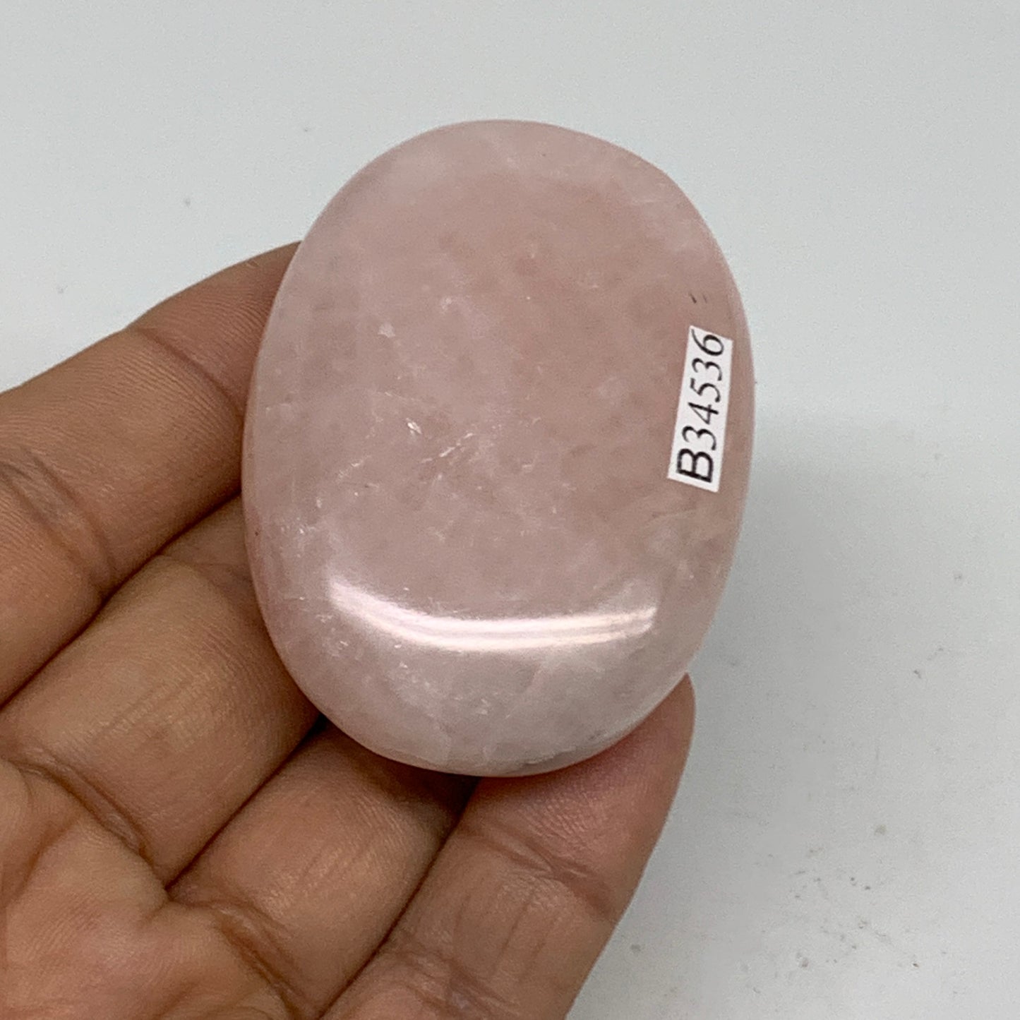 68.2g , 2.2"x1.6"x0.7", Natural Pink Rose Quartz Palm-stone Crystal, B34536