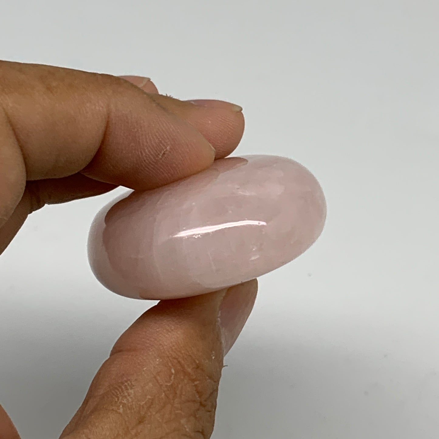 68.2g , 2.2"x1.6"x0.7", Natural Pink Rose Quartz Palm-stone Crystal, B34536