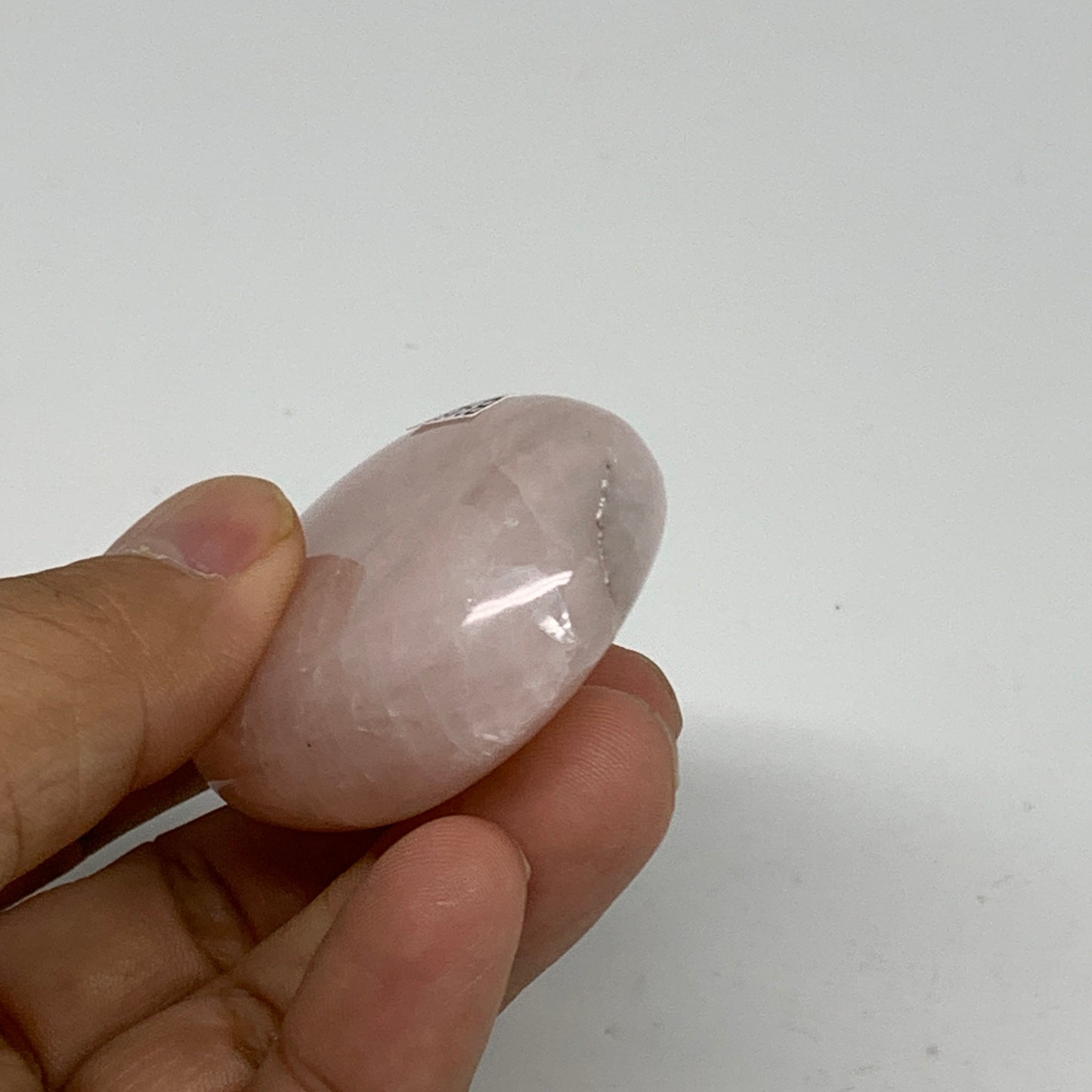 68.2g , 2.2"x1.6"x0.7", Natural Pink Rose Quartz Palm-stone Crystal, B34536