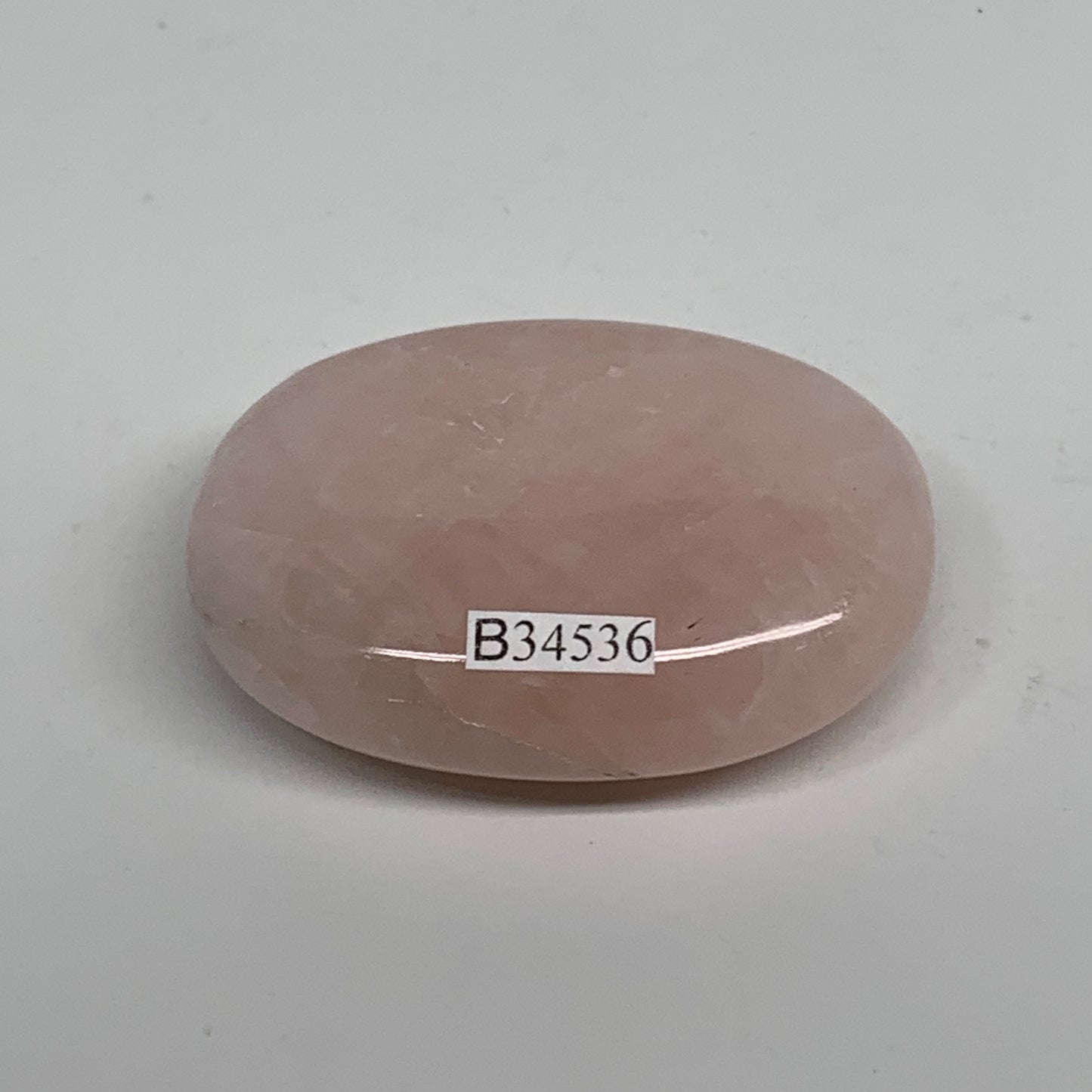 68.2g , 2.2"x1.6"x0.7", Natural Pink Rose Quartz Palm-stone Crystal, B34536