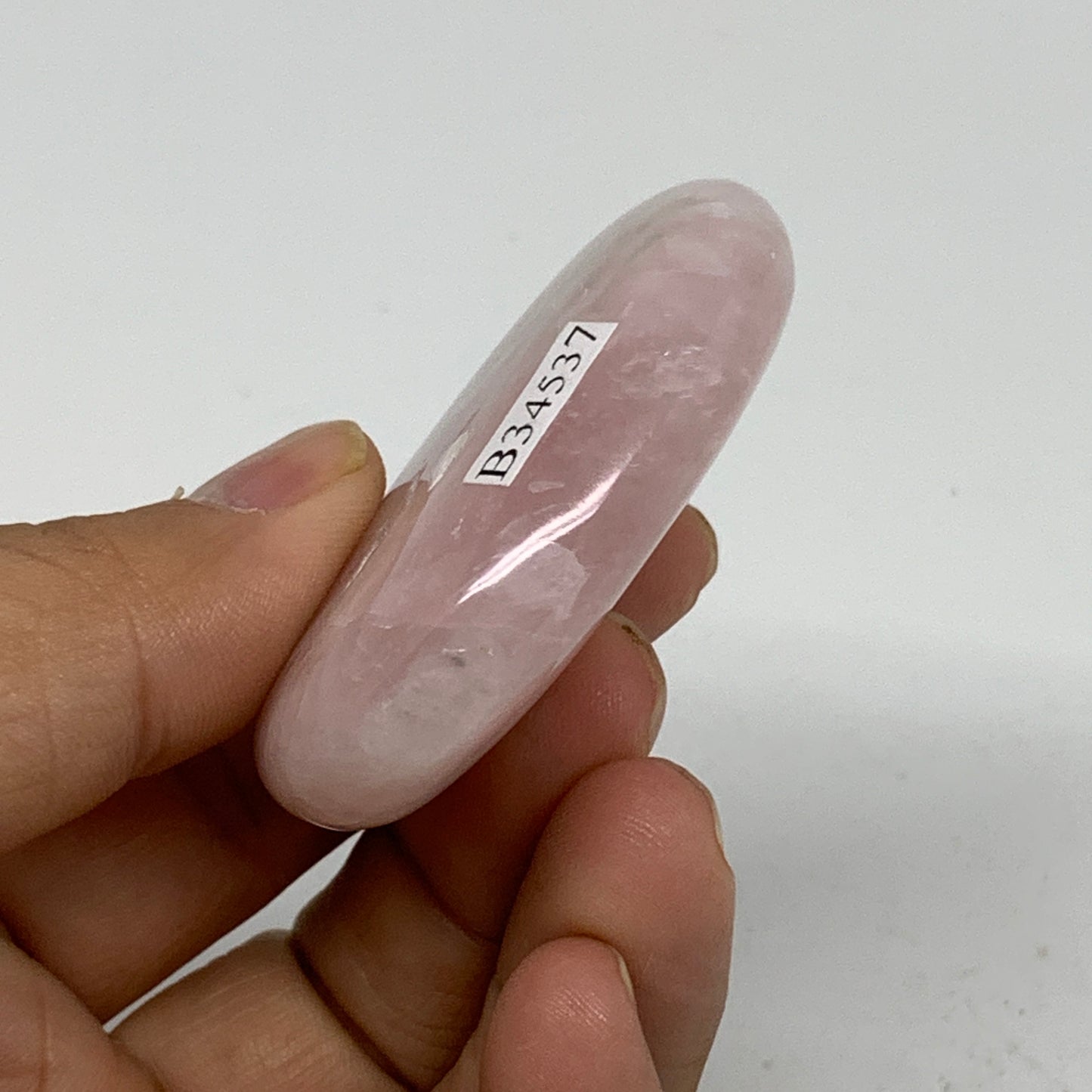 53.6g , 2.1"x1.5"x0.6", Natural Pink Rose Quartz Palm-stone Crystal, B34537