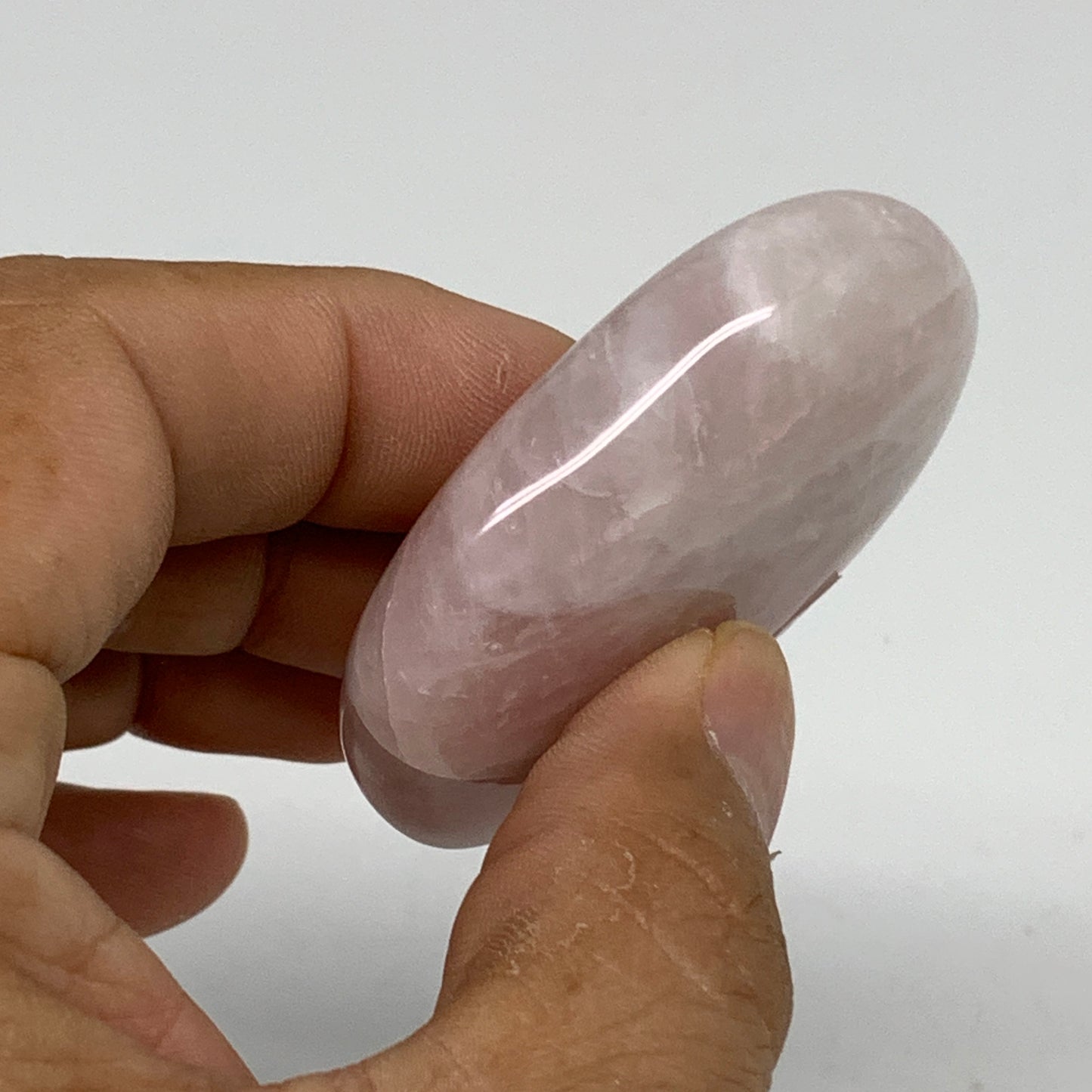 53.6g , 2.1"x1.5"x0.6", Natural Pink Rose Quartz Palm-stone Crystal, B34537