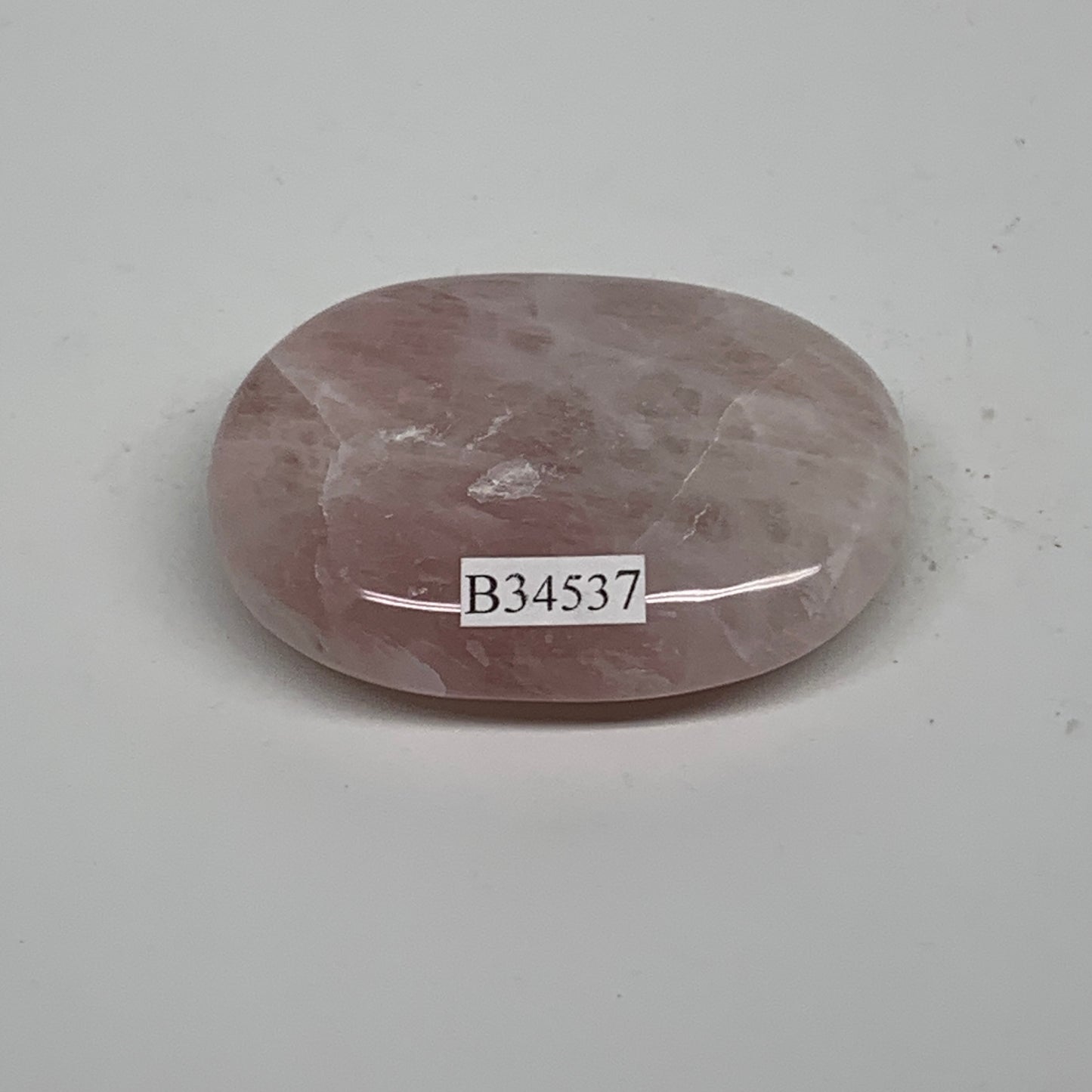 53.6g , 2.1"x1.5"x0.6", Natural Pink Rose Quartz Palm-stone Crystal, B34537