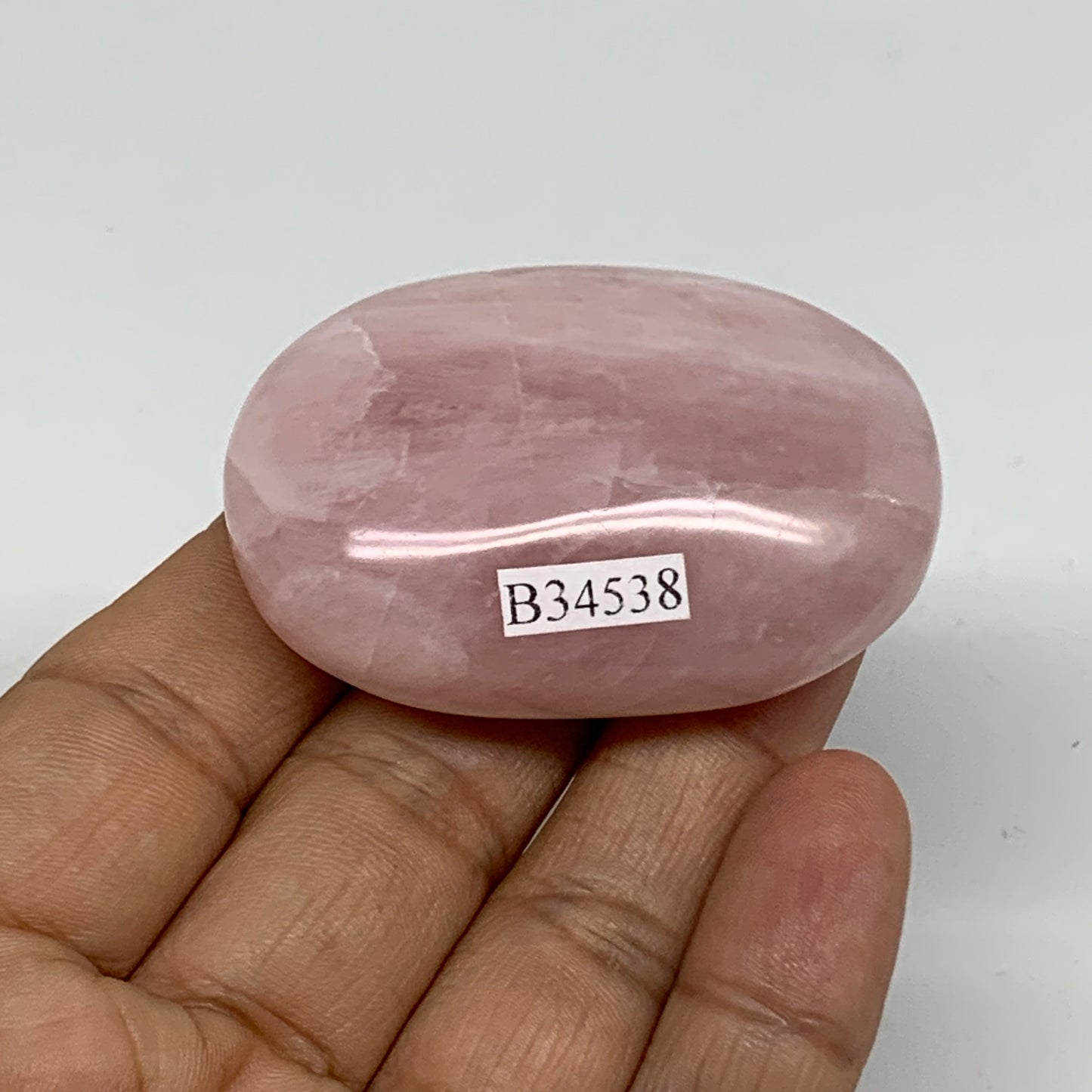 62.1g , 2.1"x1.4"x0.8", Natural Pink Rose Quartz Palm-stone Crystal, B34538