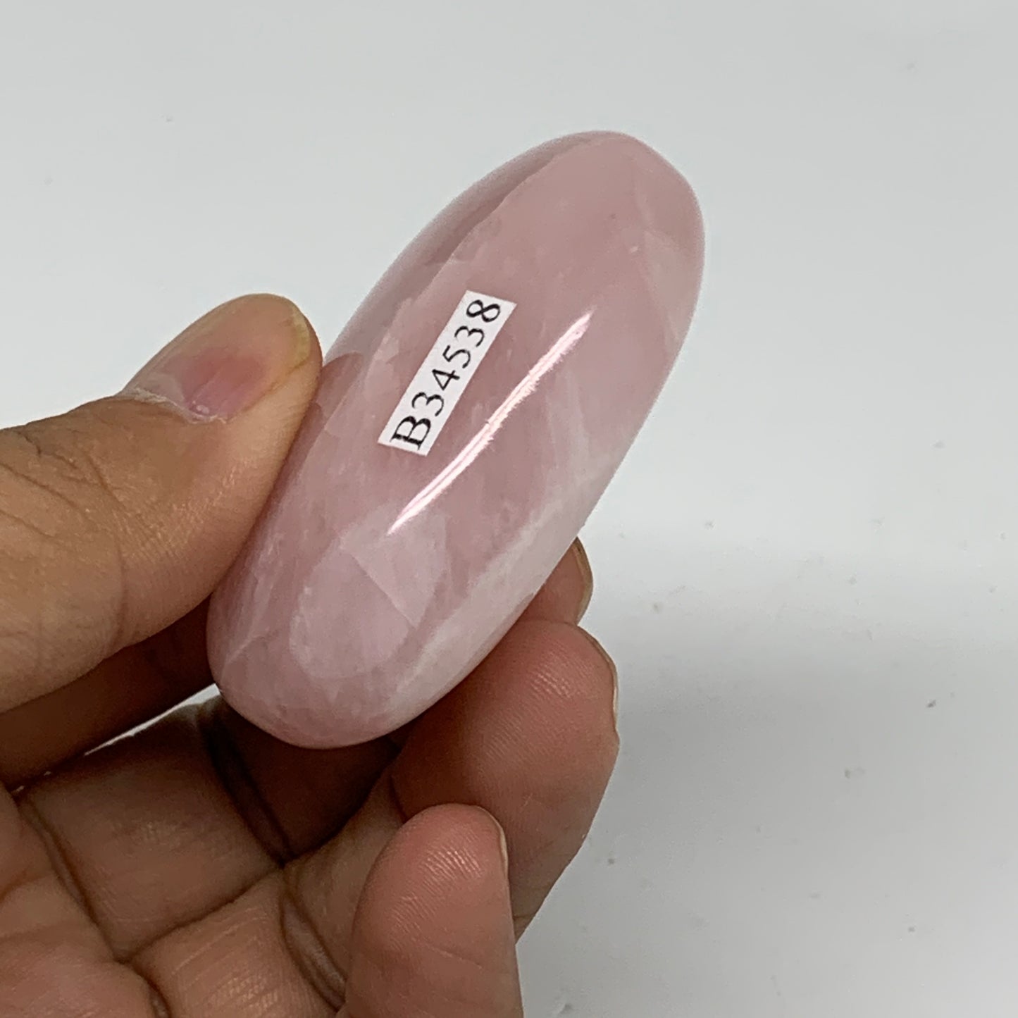 62.1g , 2.1"x1.4"x0.8", Natural Pink Rose Quartz Palm-stone Crystal, B34538