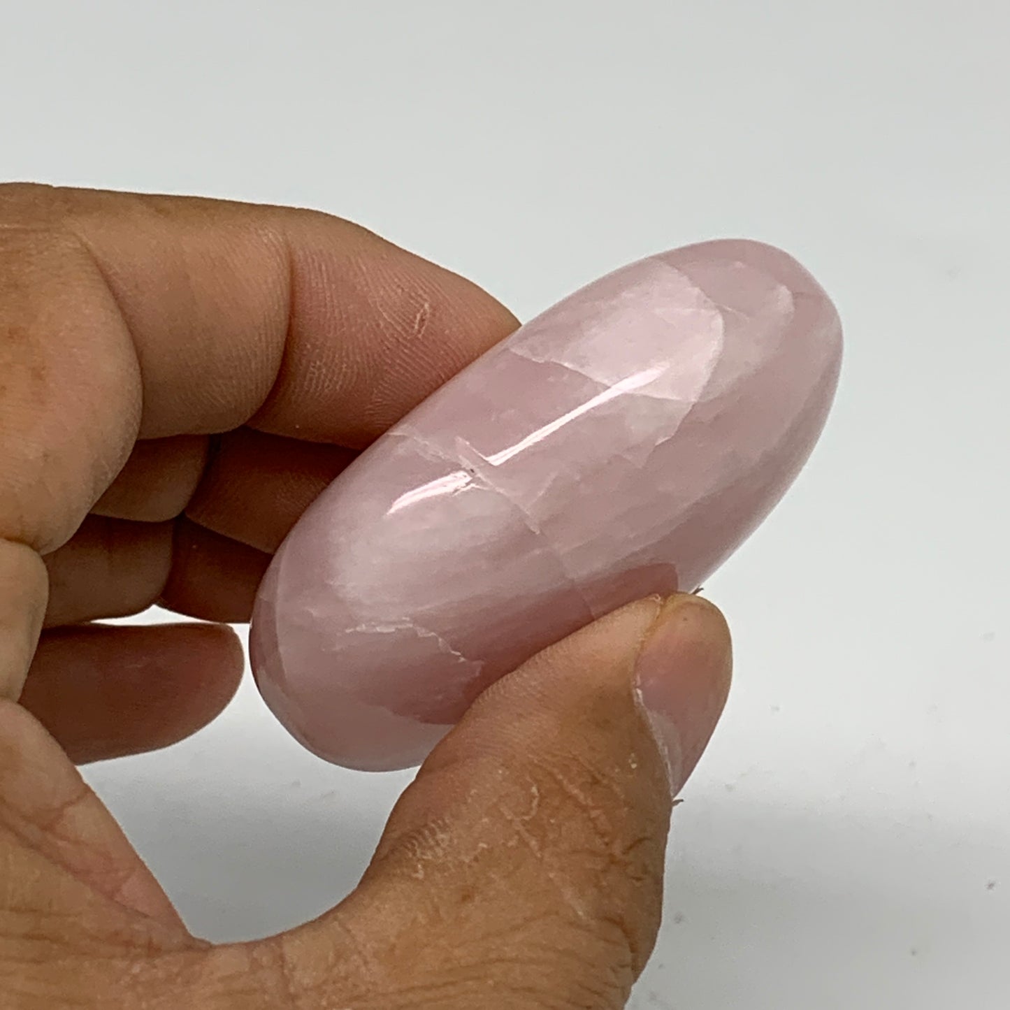 62.1g , 2.1"x1.4"x0.8", Natural Pink Rose Quartz Palm-stone Crystal, B34538