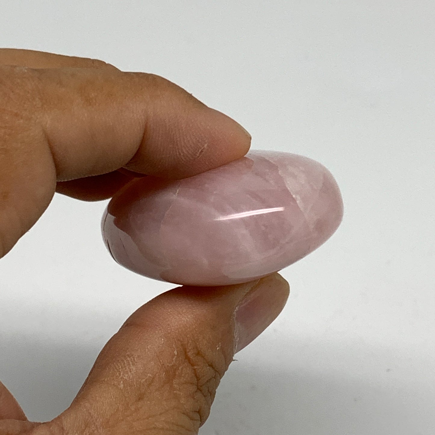 62.1g , 2.1"x1.4"x0.8", Natural Pink Rose Quartz Palm-stone Crystal, B34538