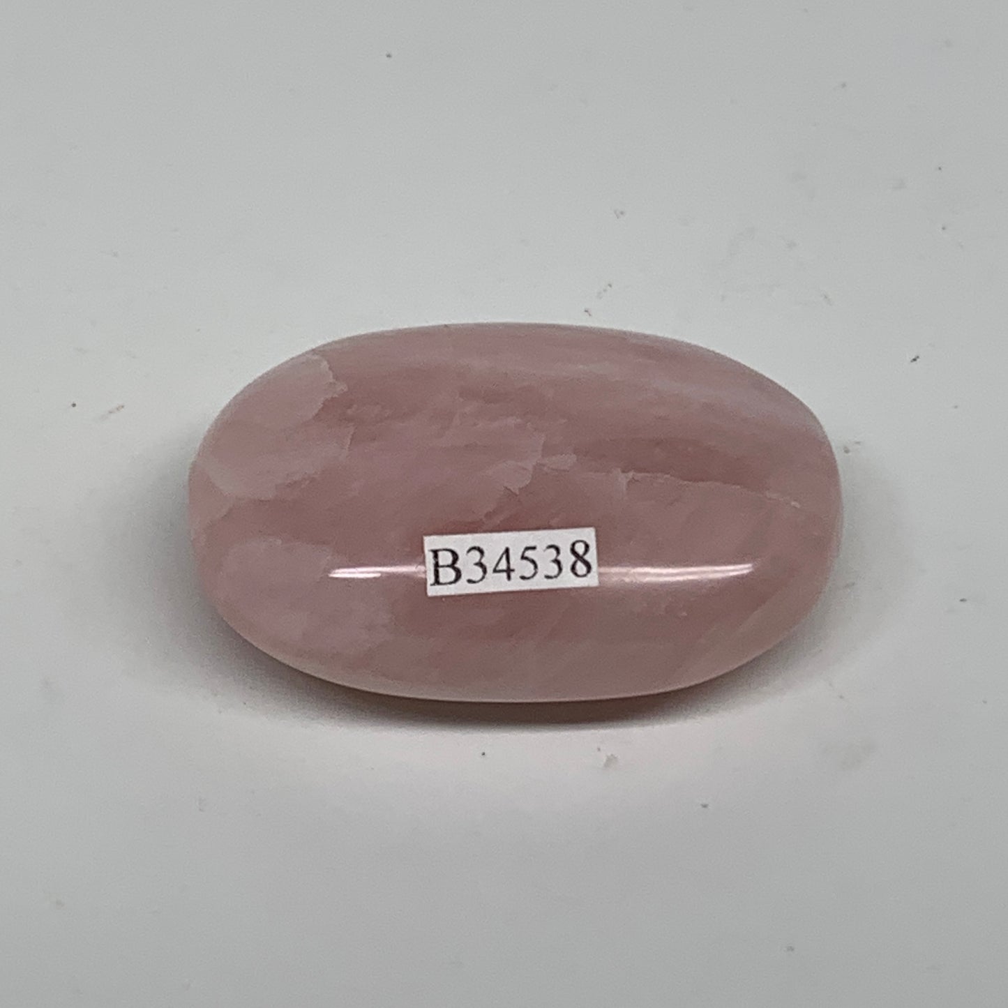 62.1g , 2.1"x1.4"x0.8", Natural Pink Rose Quartz Palm-stone Crystal, B34538