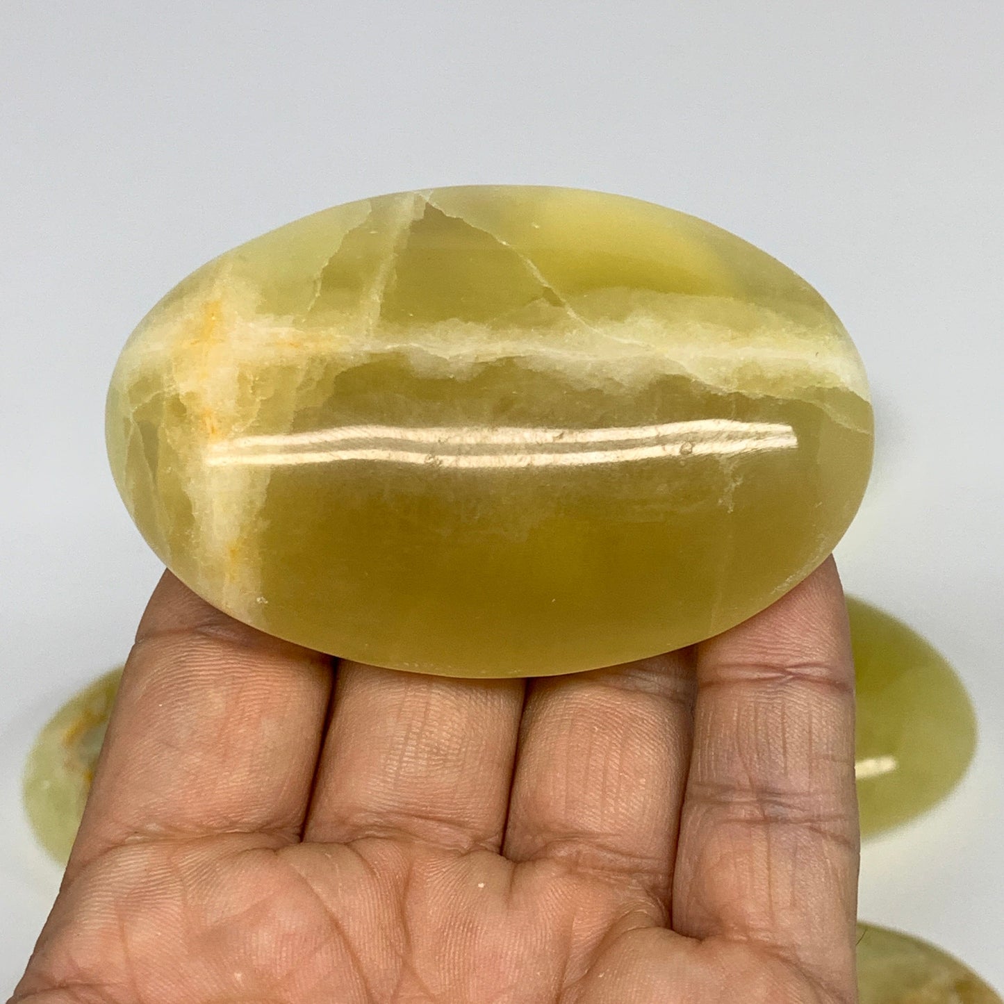 2.2 lbs (1000 Grams), 2.2"-2.9", 9pcs, Lemon Calcite Palm-Stone Polished, B24692