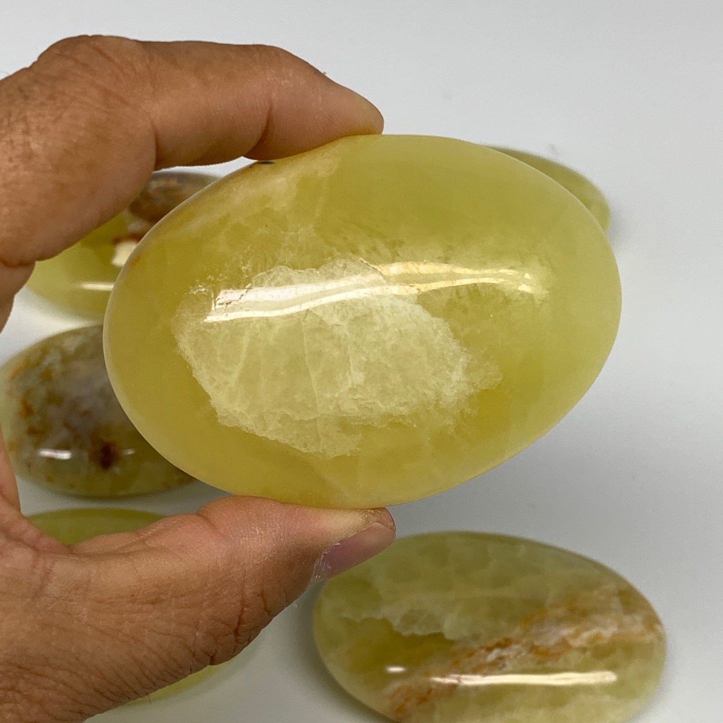 2.2 lbs (1000 Grams), 2.2"-2.9", 9pcs, Lemon Calcite Palm-Stone Polished, B24692