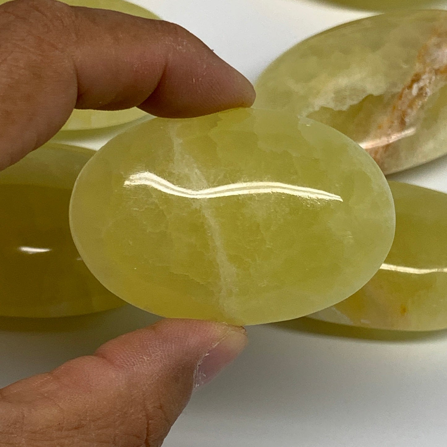 2.2 lbs (1000 Grams), 2.2"-2.9", 9pcs, Lemon Calcite Palm-Stone Polished, B24692